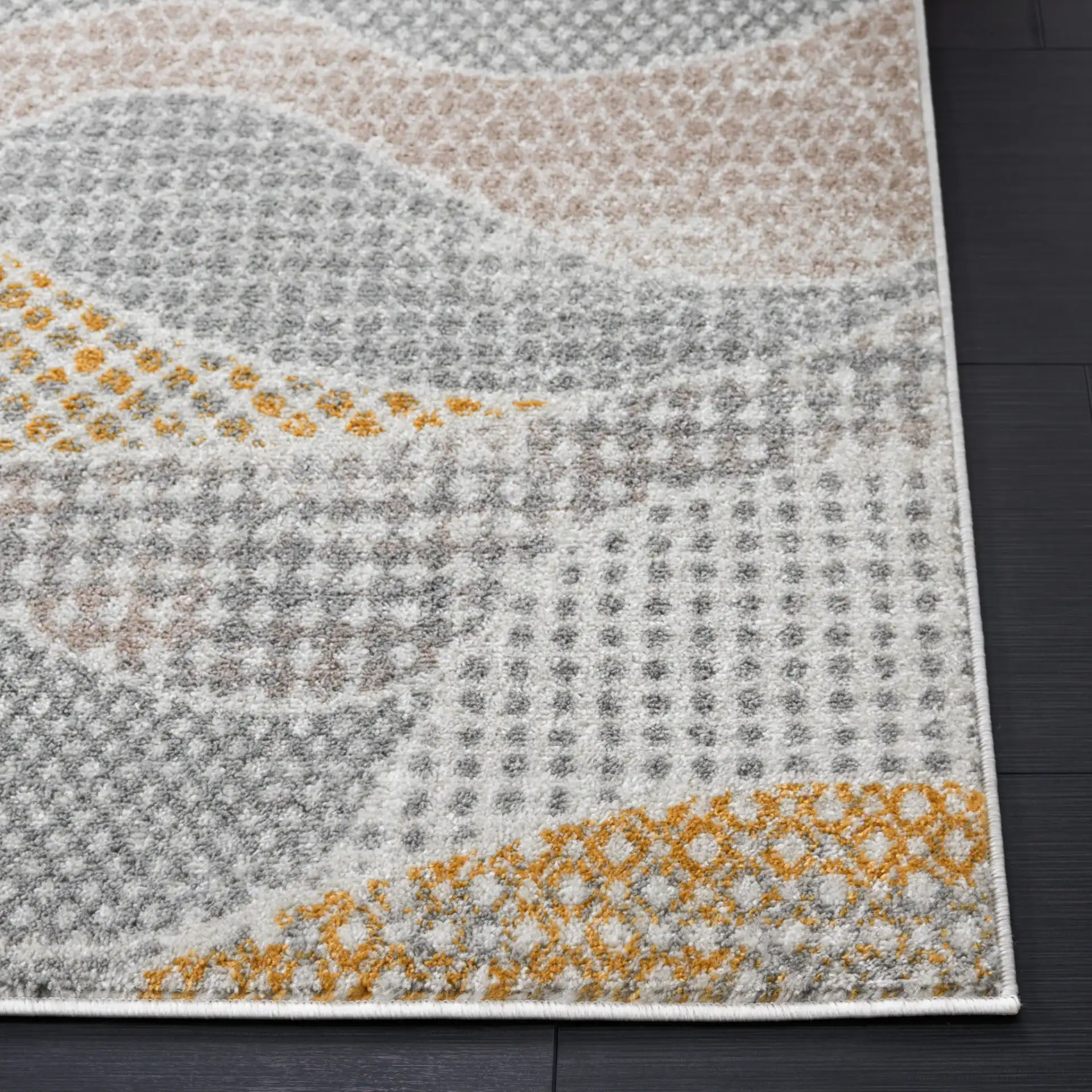 Skyler Dotted Wave Rug in Gray Beige / Gold in a styled room