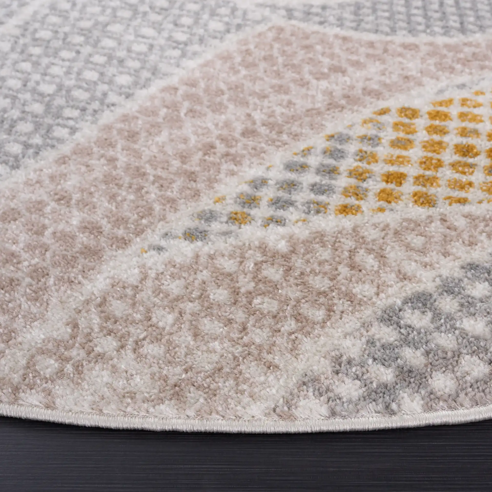 Skyler Dotted Wave Rug in Gray Beige / Gold in a styled room