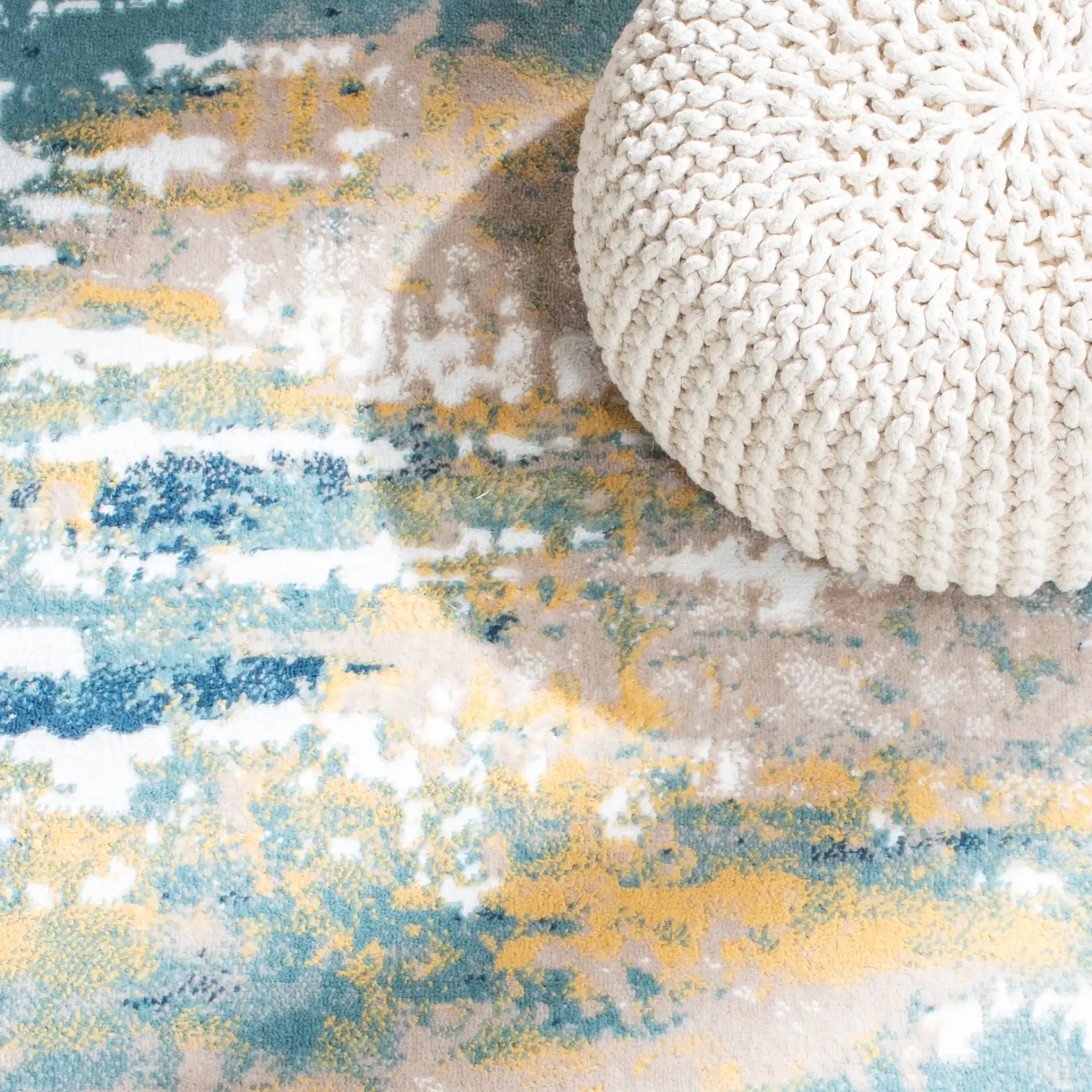 Skyler Abstract Painterly Rug in Teal / Gold in a styled room