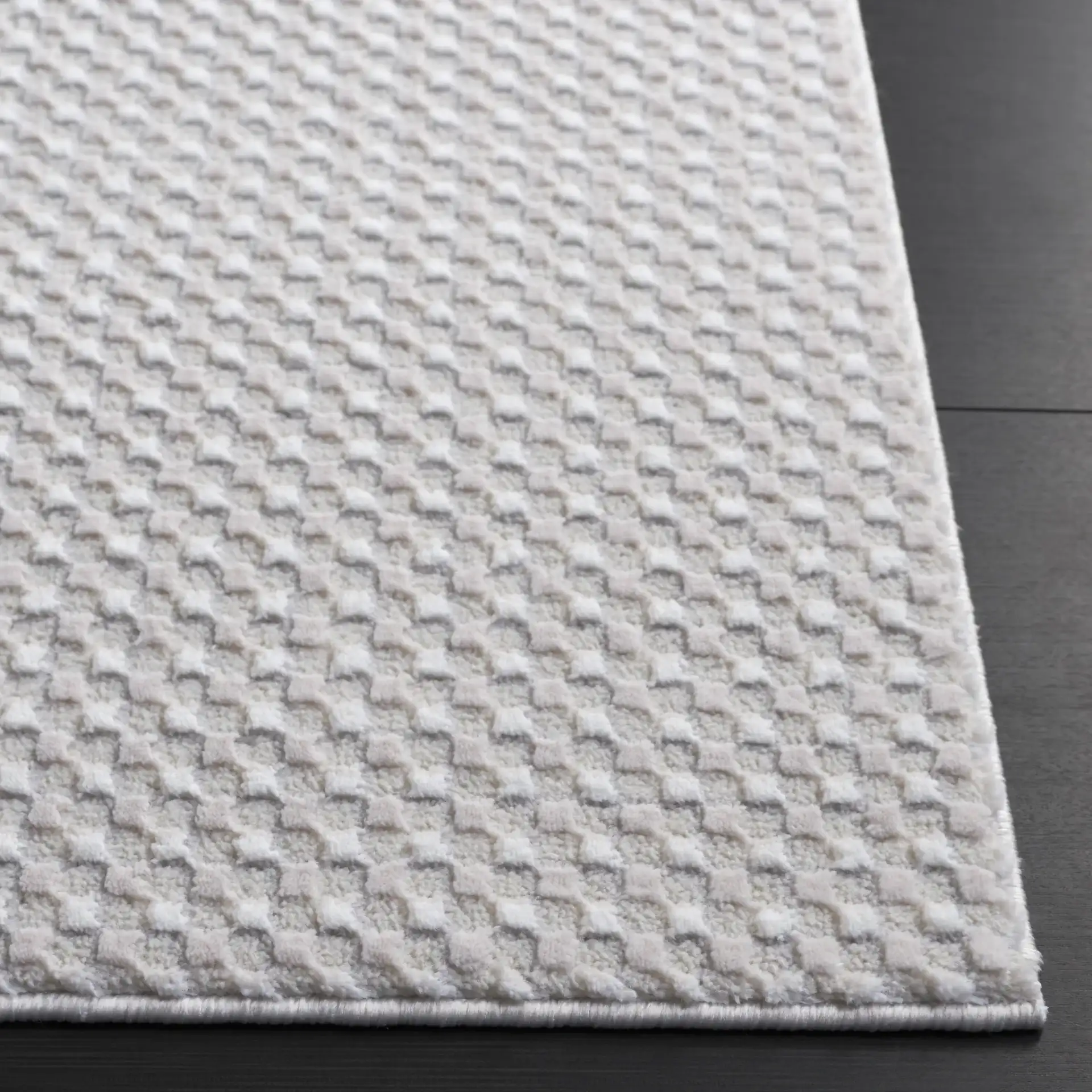 Slate Textured Grid Rug in Taupe / Ivory in a styled room