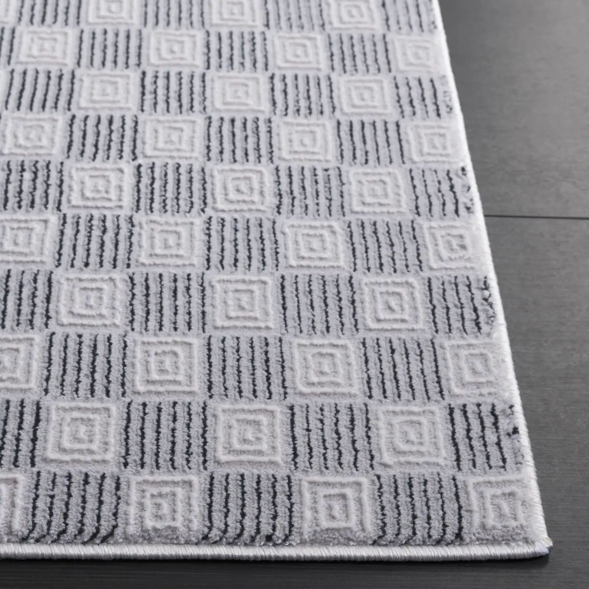 Slate Checkerboard Square Rug in Gray / Ivory Black in a styled room