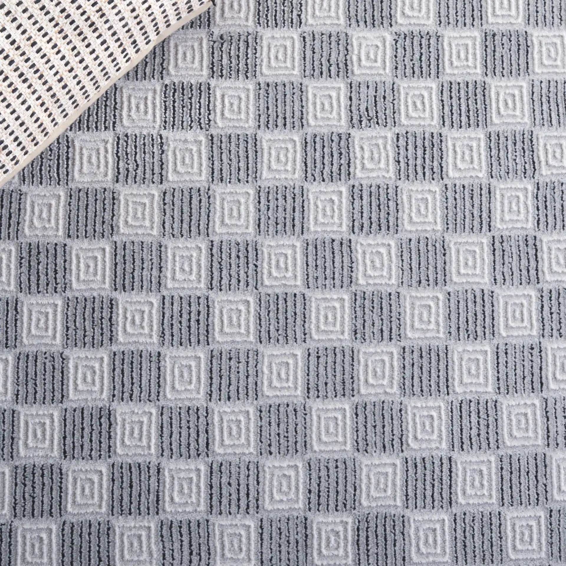 Slate Checkerboard Square Rug in Gray / Ivory Black in a styled room