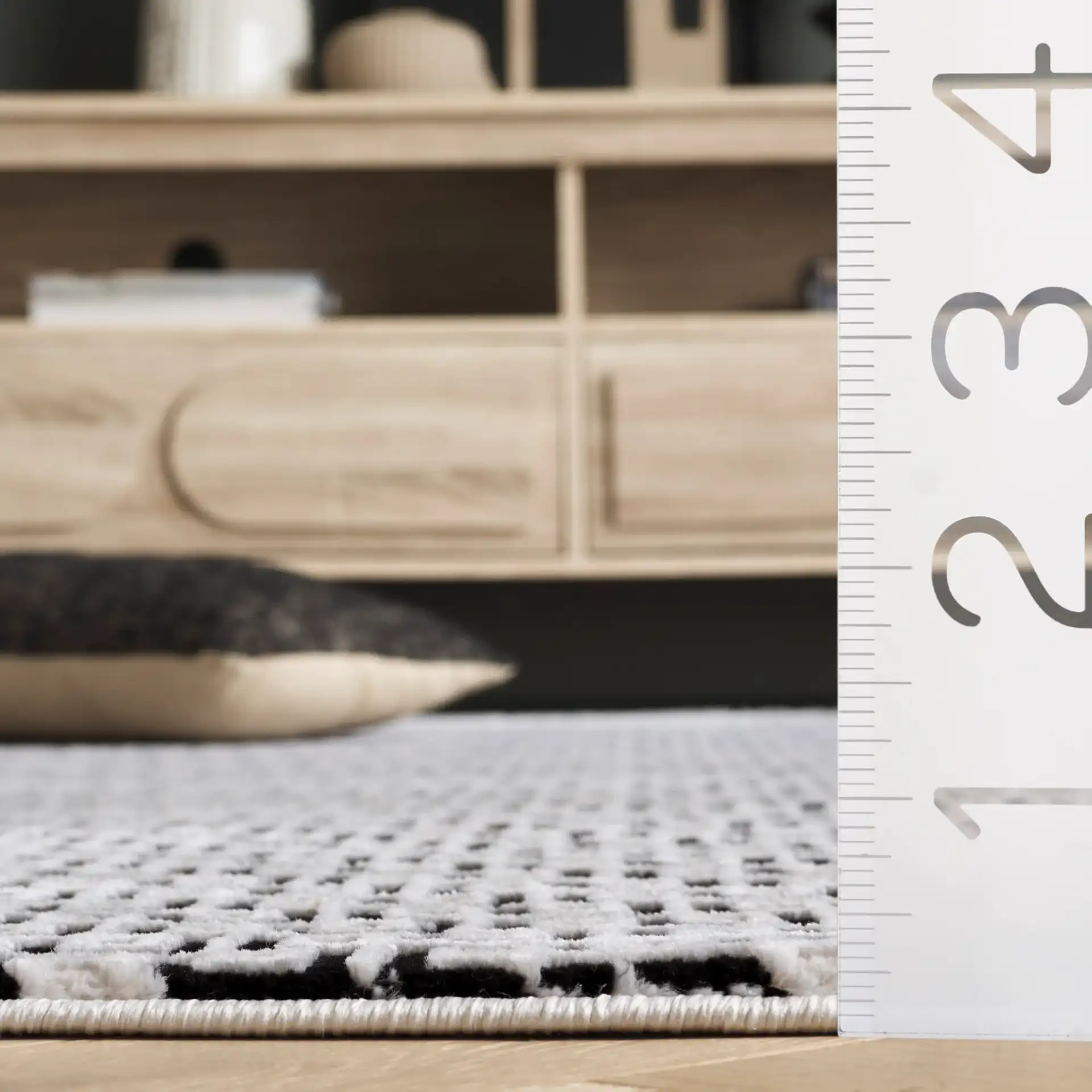 Slate Interlocking Maze Rug in Ivory / Black in a styled room