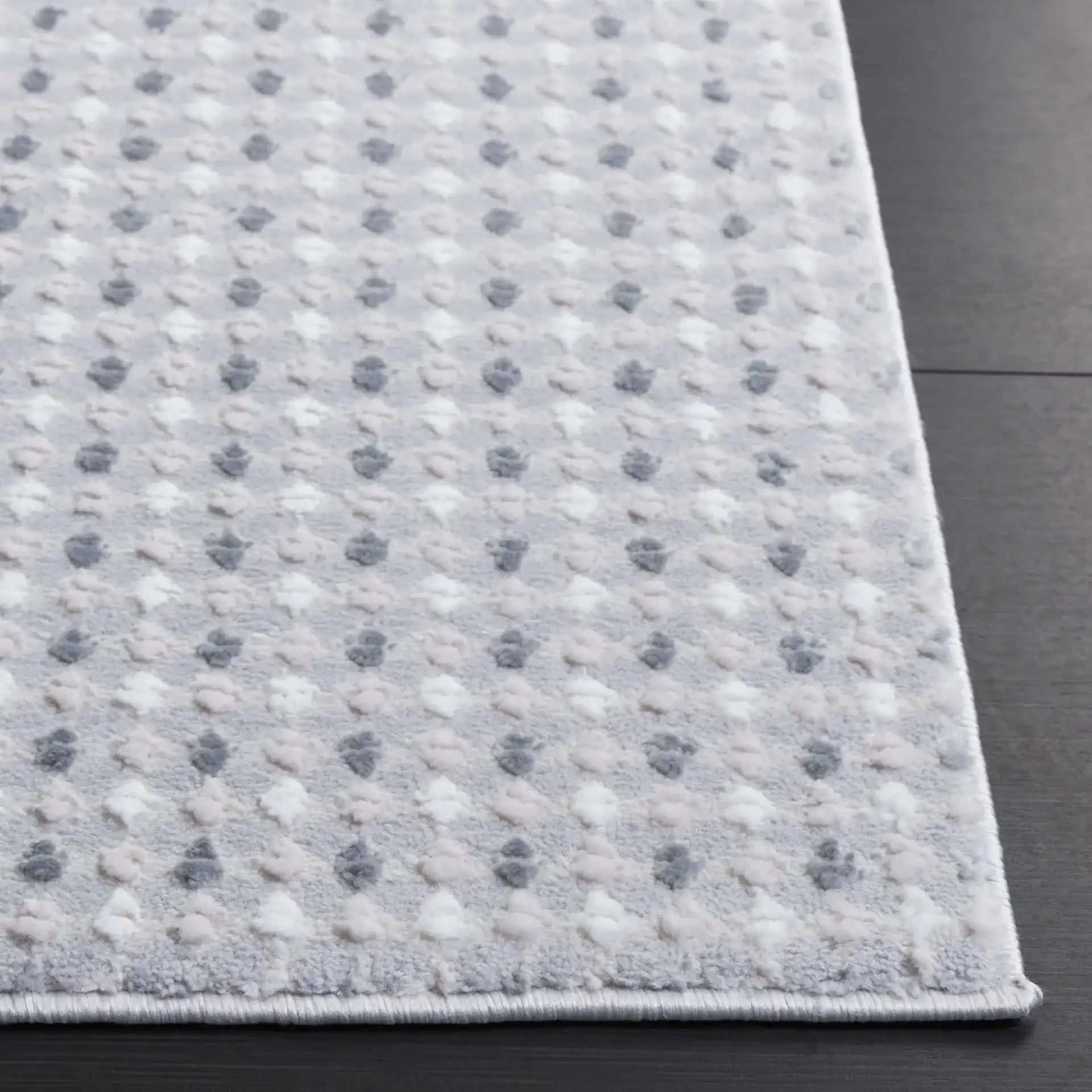 Slate Grid Rug in Gray / Ivory in a styled room