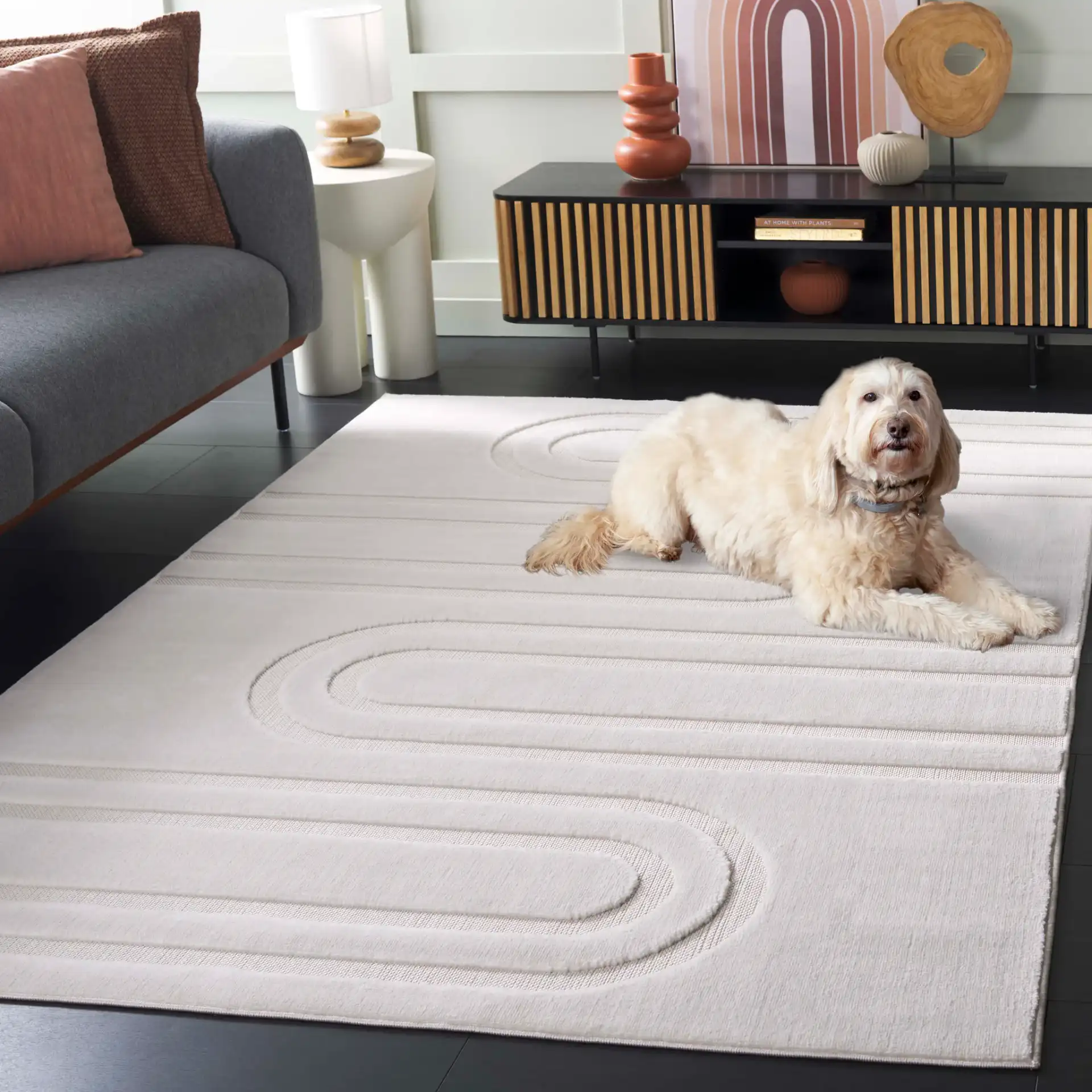 Selena Arch Rug in Ivory in a styled room