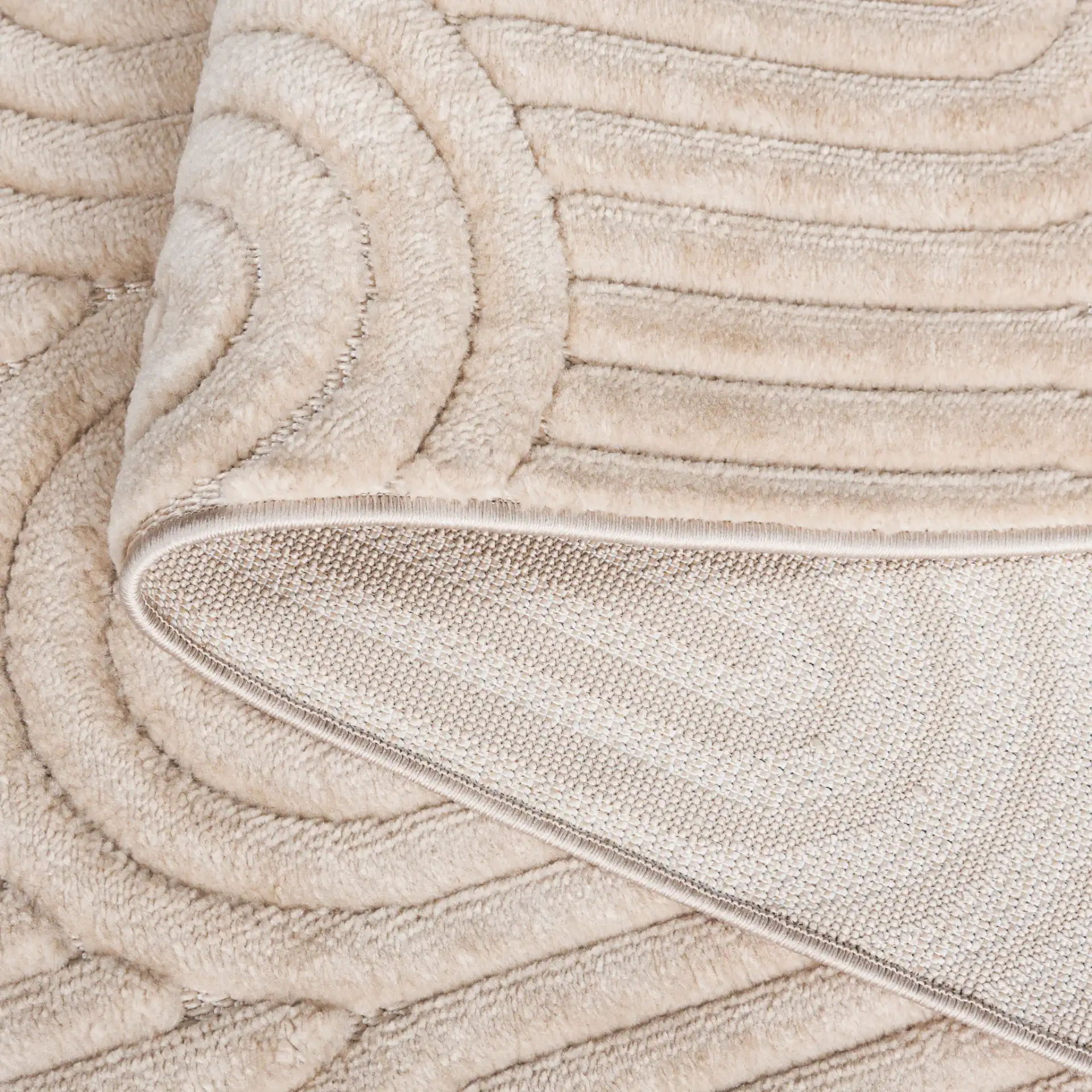 Selena Concentric Arch Rug in Beige in a styled room