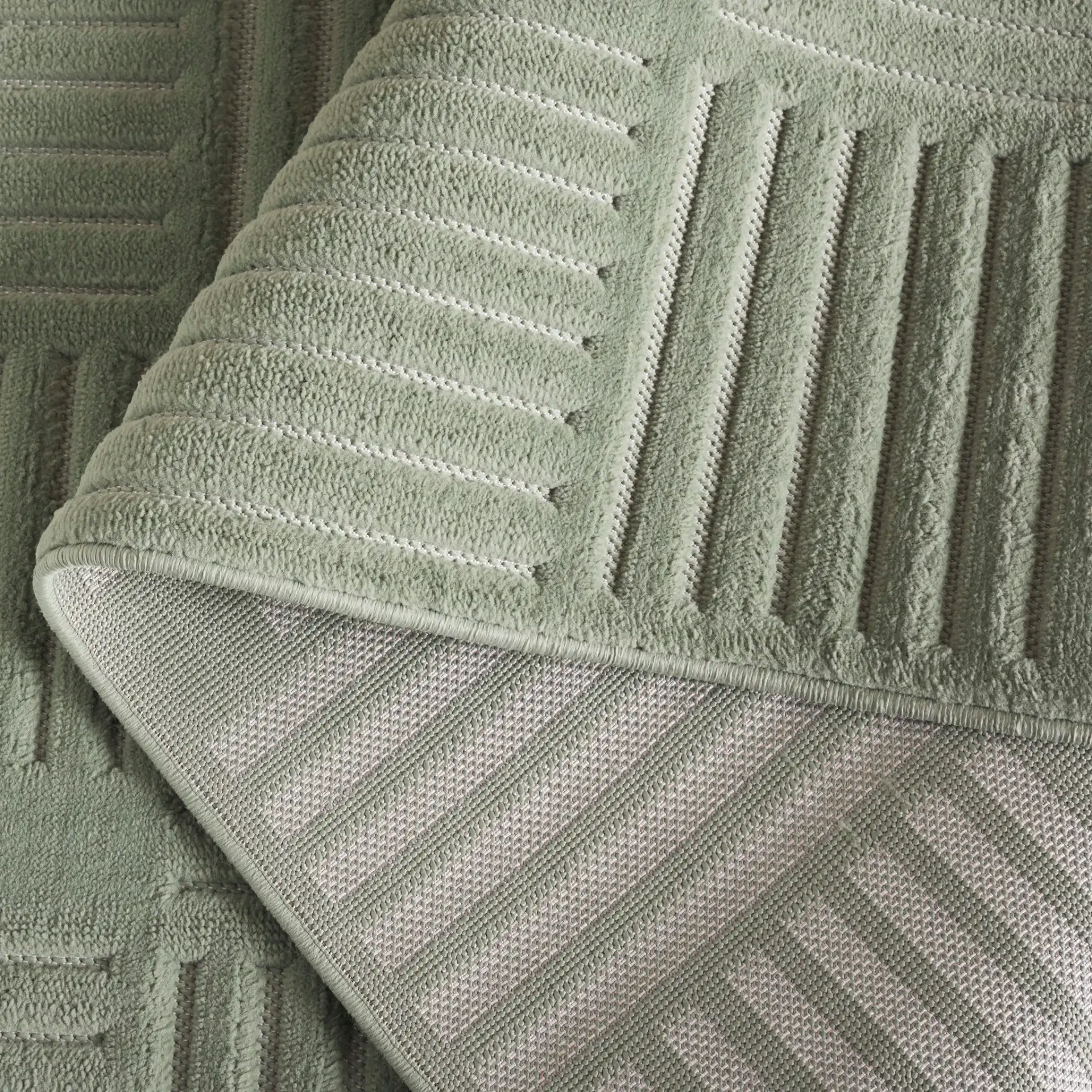 Selena Basketweave Stripe Rug in Green in a styled room