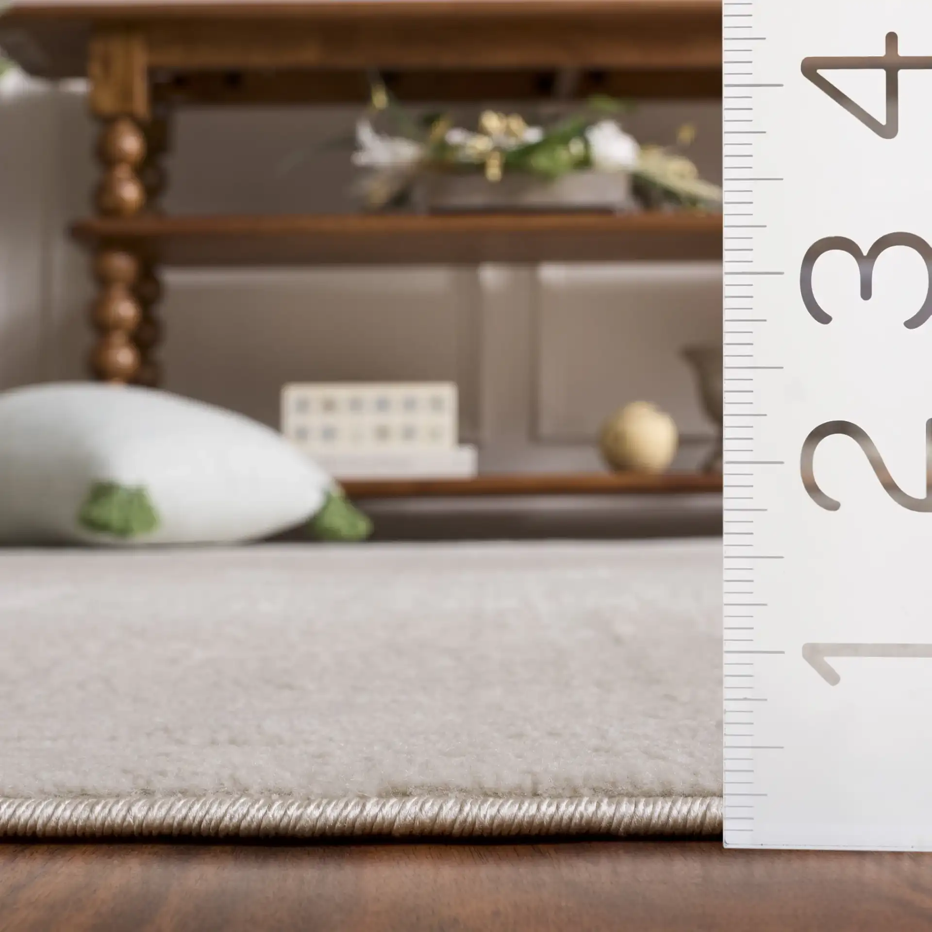 Selena Ribbed Rug in Ivory in a styled room