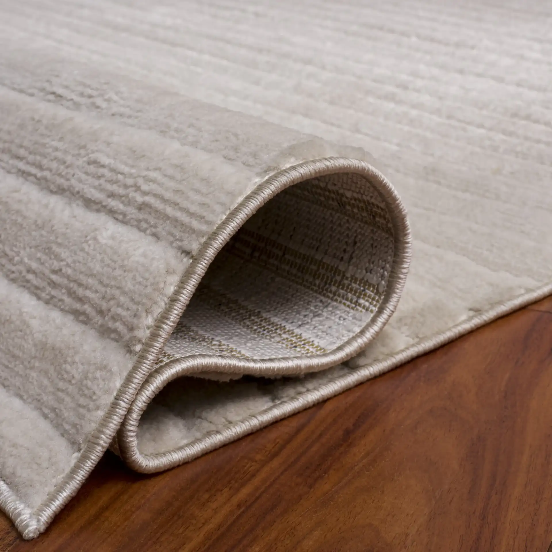 Selena Ribbed Rug in Ivory in a styled room