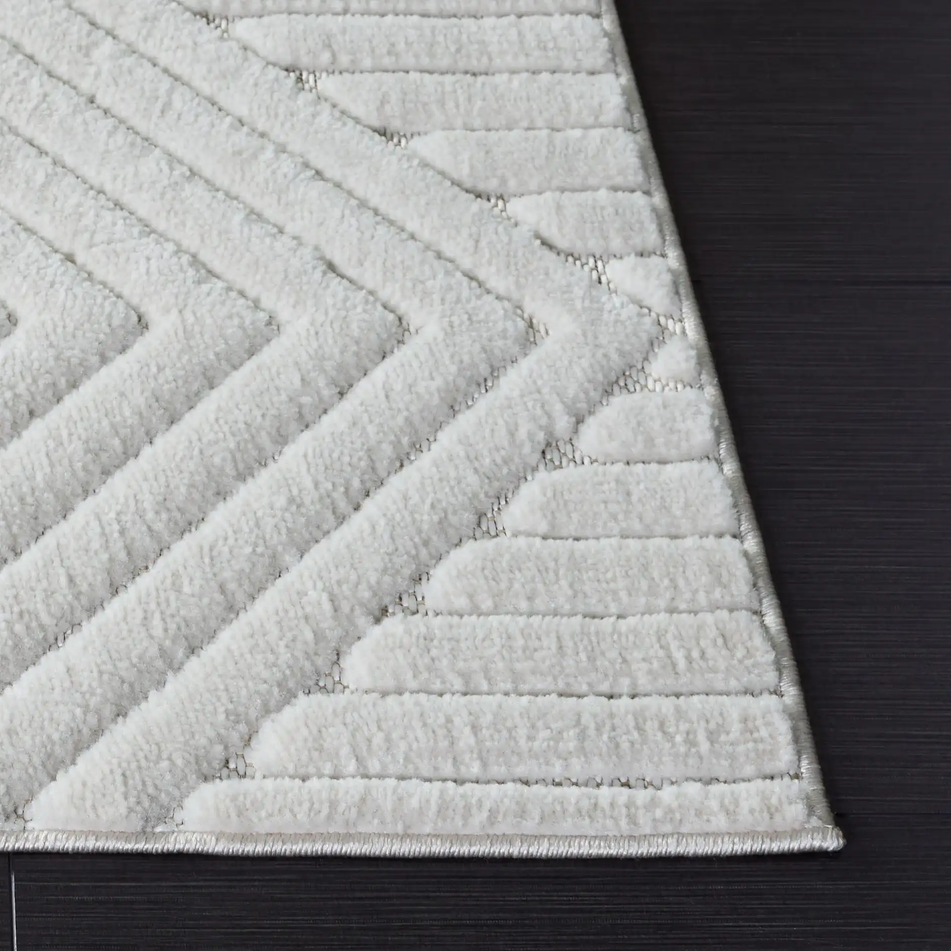 Selena Diamond Ribbed Rug in Ivory in a styled room