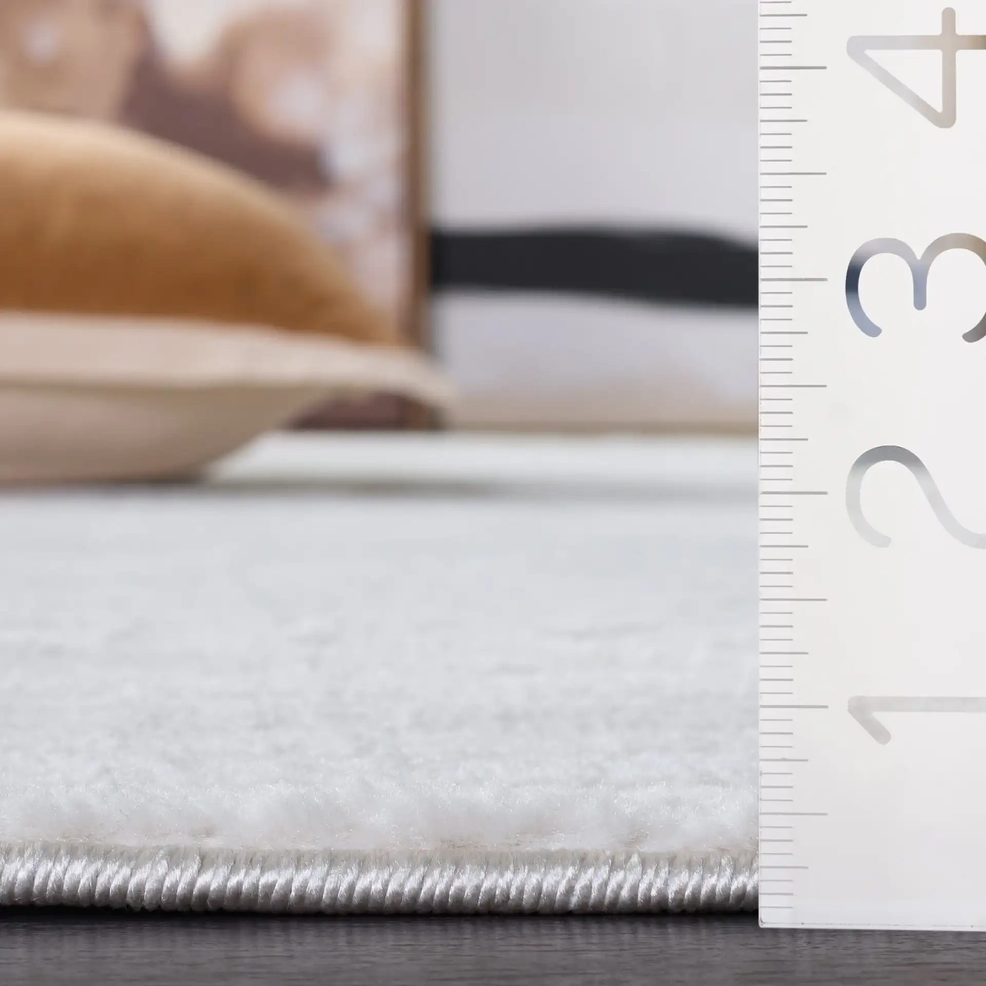 Selena Diamond Ribbed Rug in Ivory in a styled room