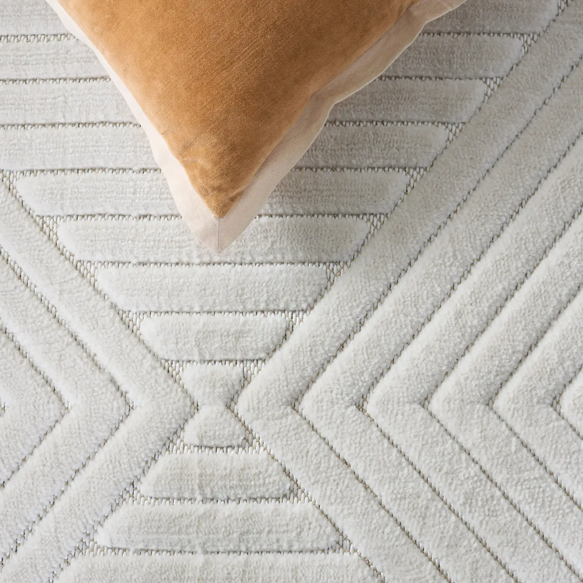 Selena Diamond Ribbed Rug in Ivory in a styled room