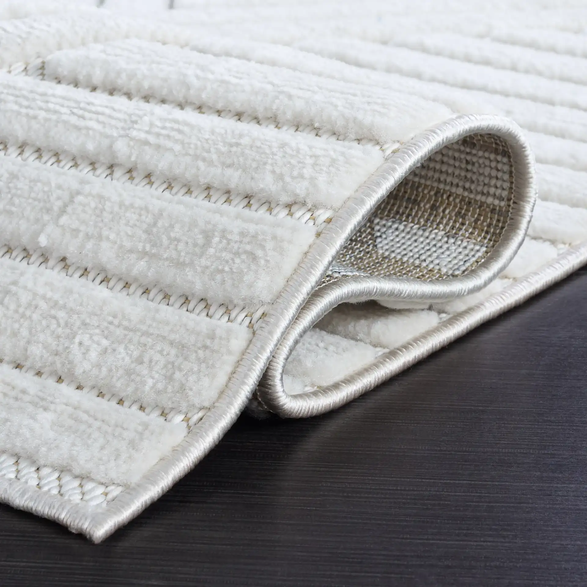 Selena Diamond Ribbed Rug in Ivory in a styled room