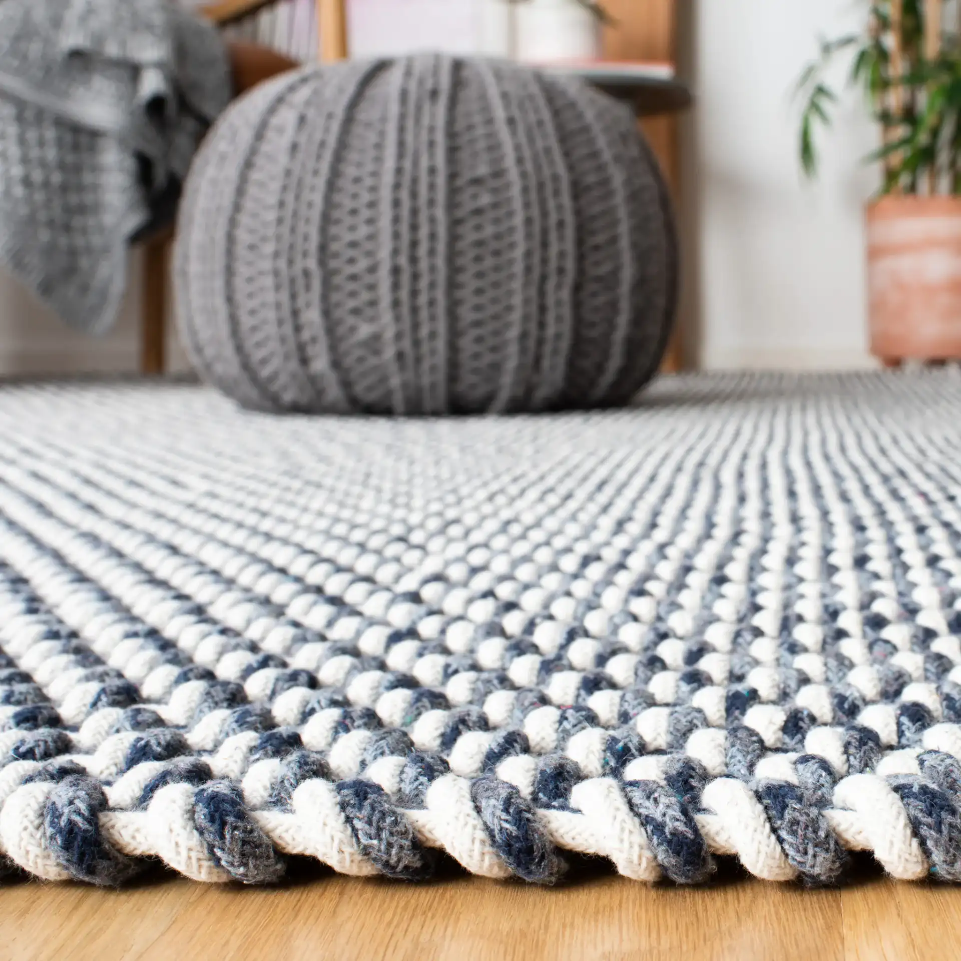 Salem Basketweave Hand-Woven Cotton Rug in Dark Blue in a styled room