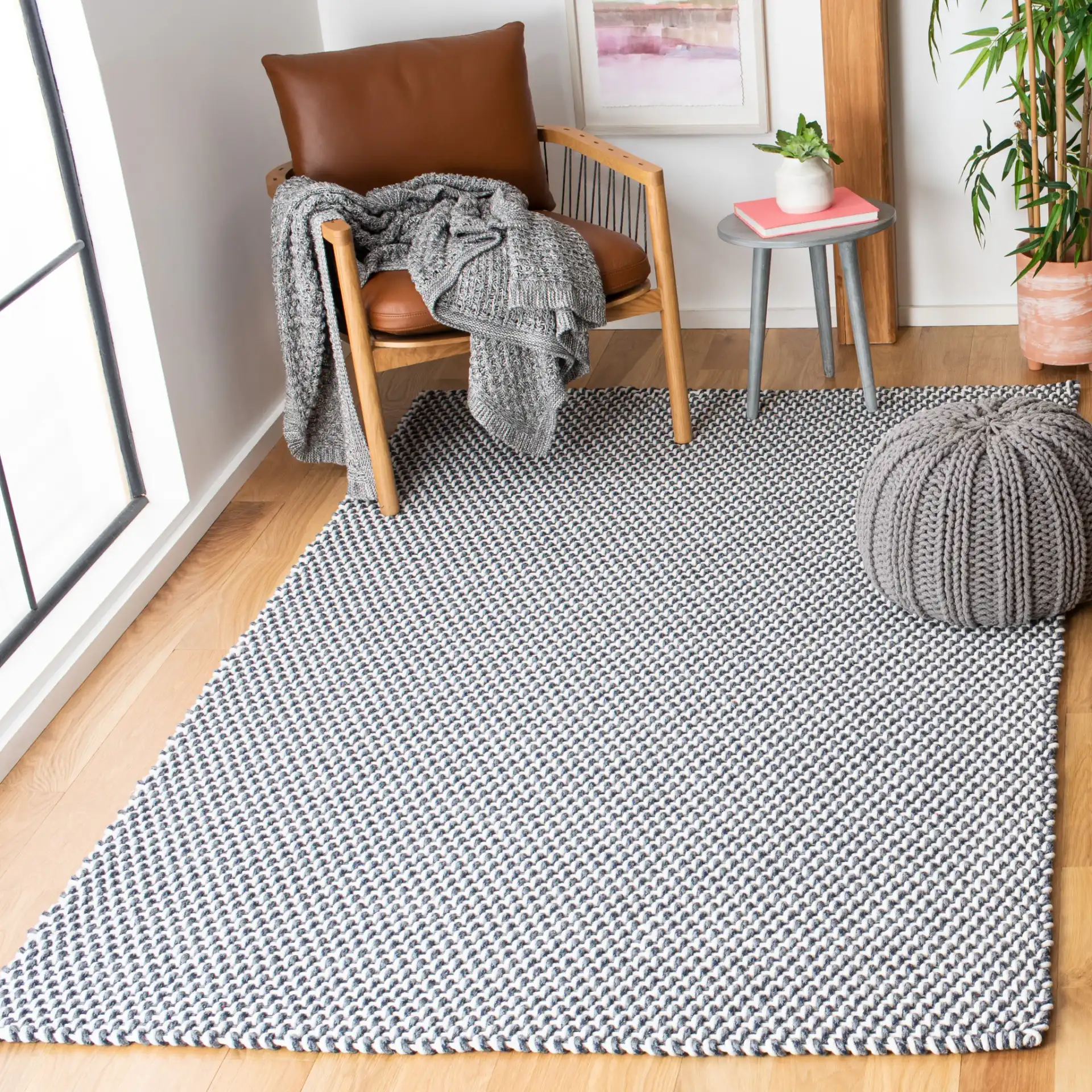 Salem Basketweave Hand-Woven Cotton Rug in Dark Blue in a styled room