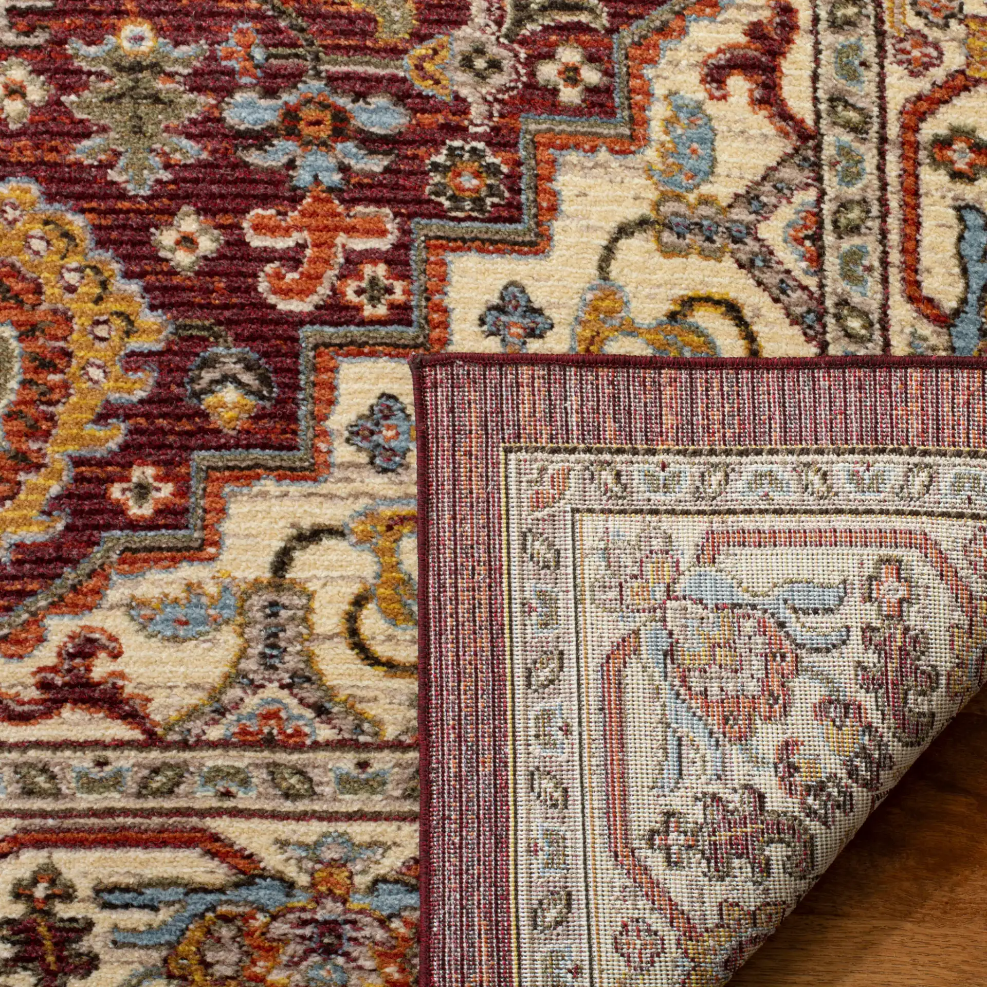 Summit Medallion Rug in Red / Cream in a styled room