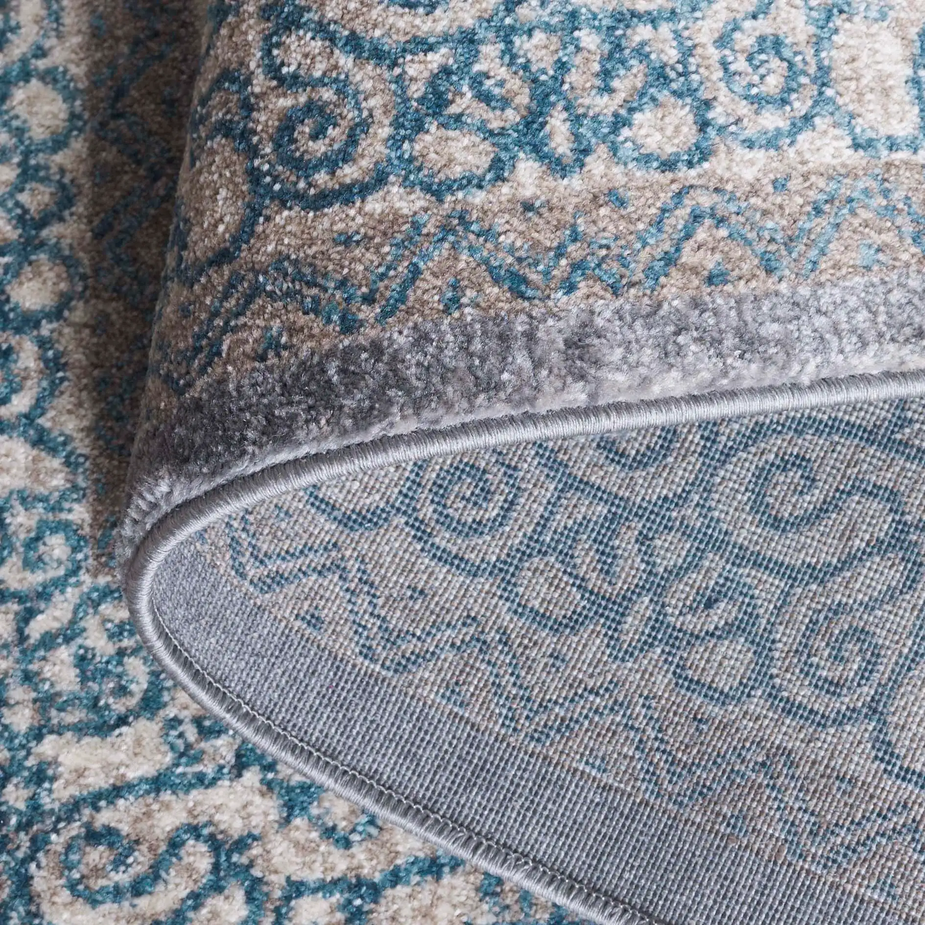 Sofia Medallion Border Rug in Light Gray / Blue in a styled room