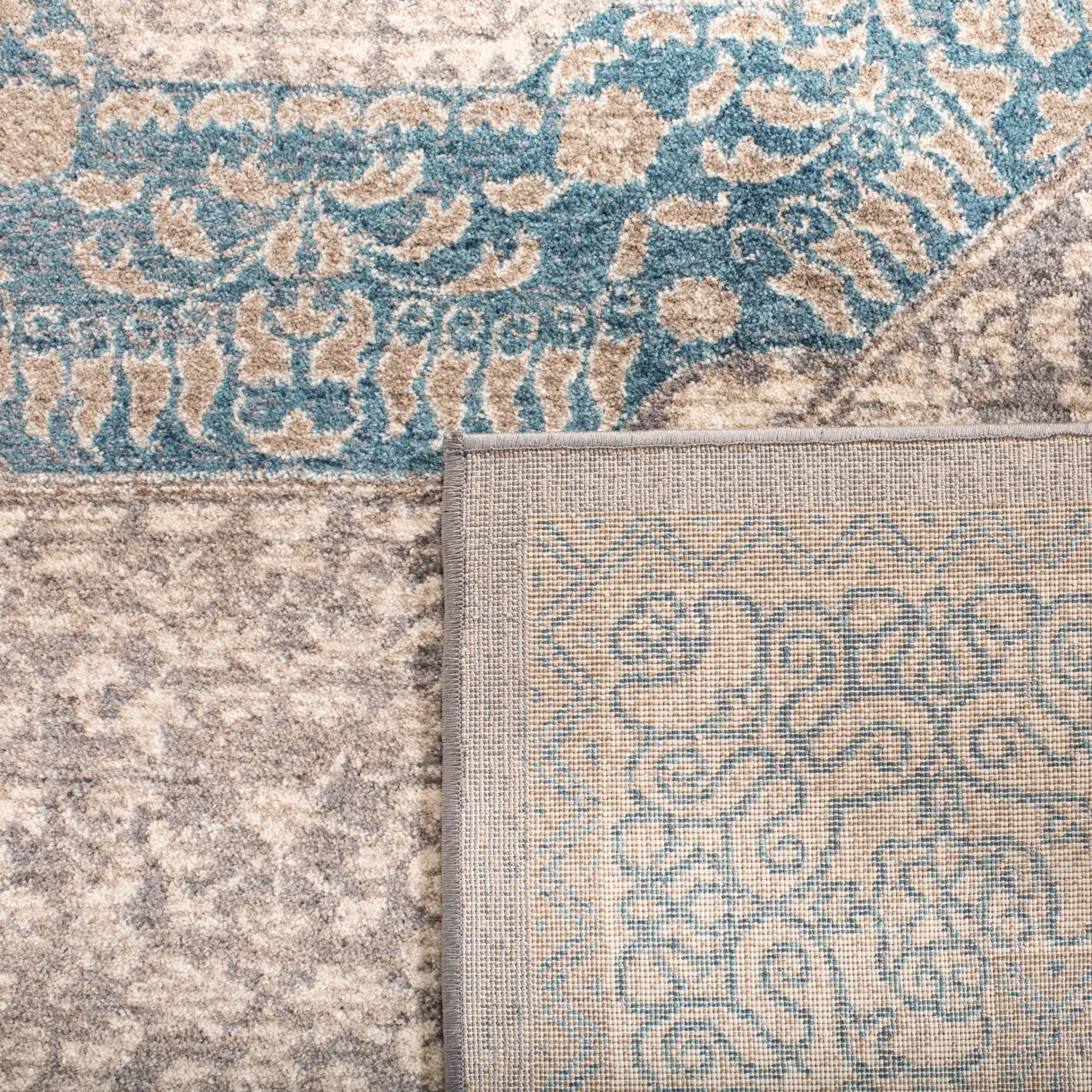 Sofia Medallion Border Rug in Light Gray / Blue in a styled room