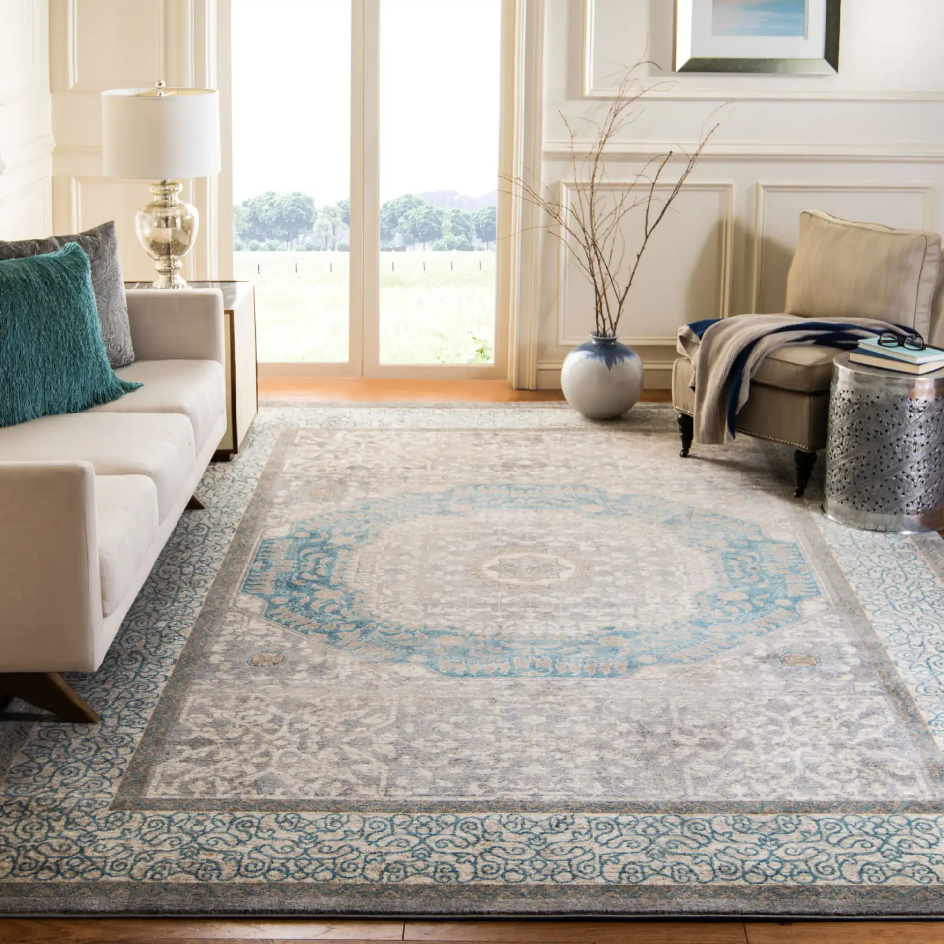 Sofia Medallion Border Rug in Light Gray / Blue in a styled room