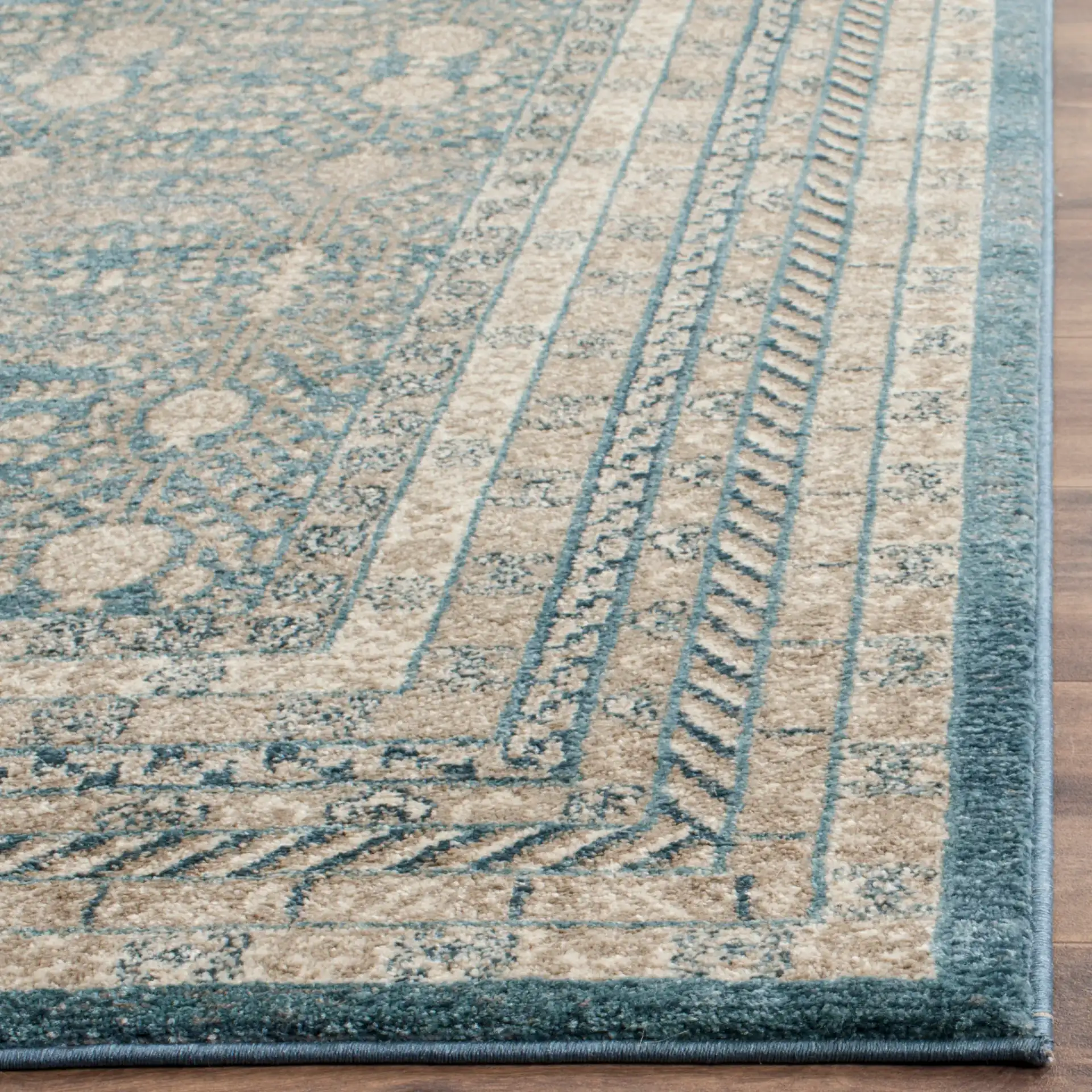 Sofia Bordered Floral Rug in Blue / Beige in a styled room