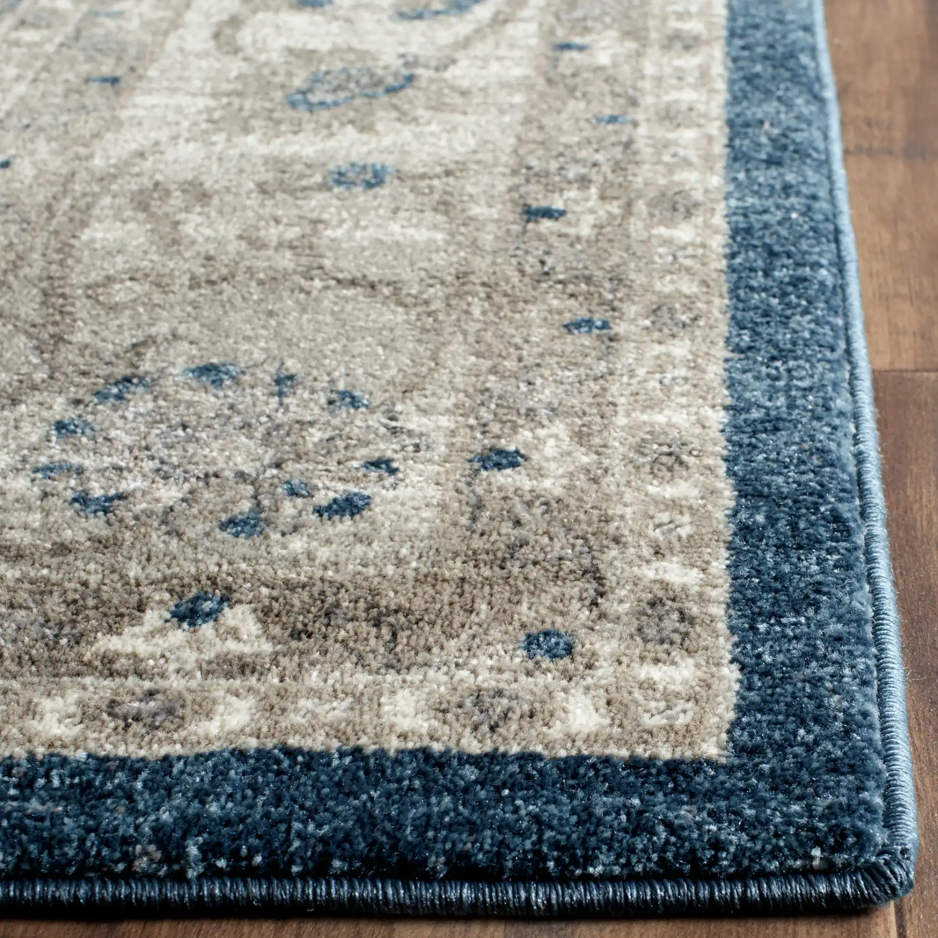 Sofia Floral Diamond Lattice Rug in Blue / Beige in a styled room