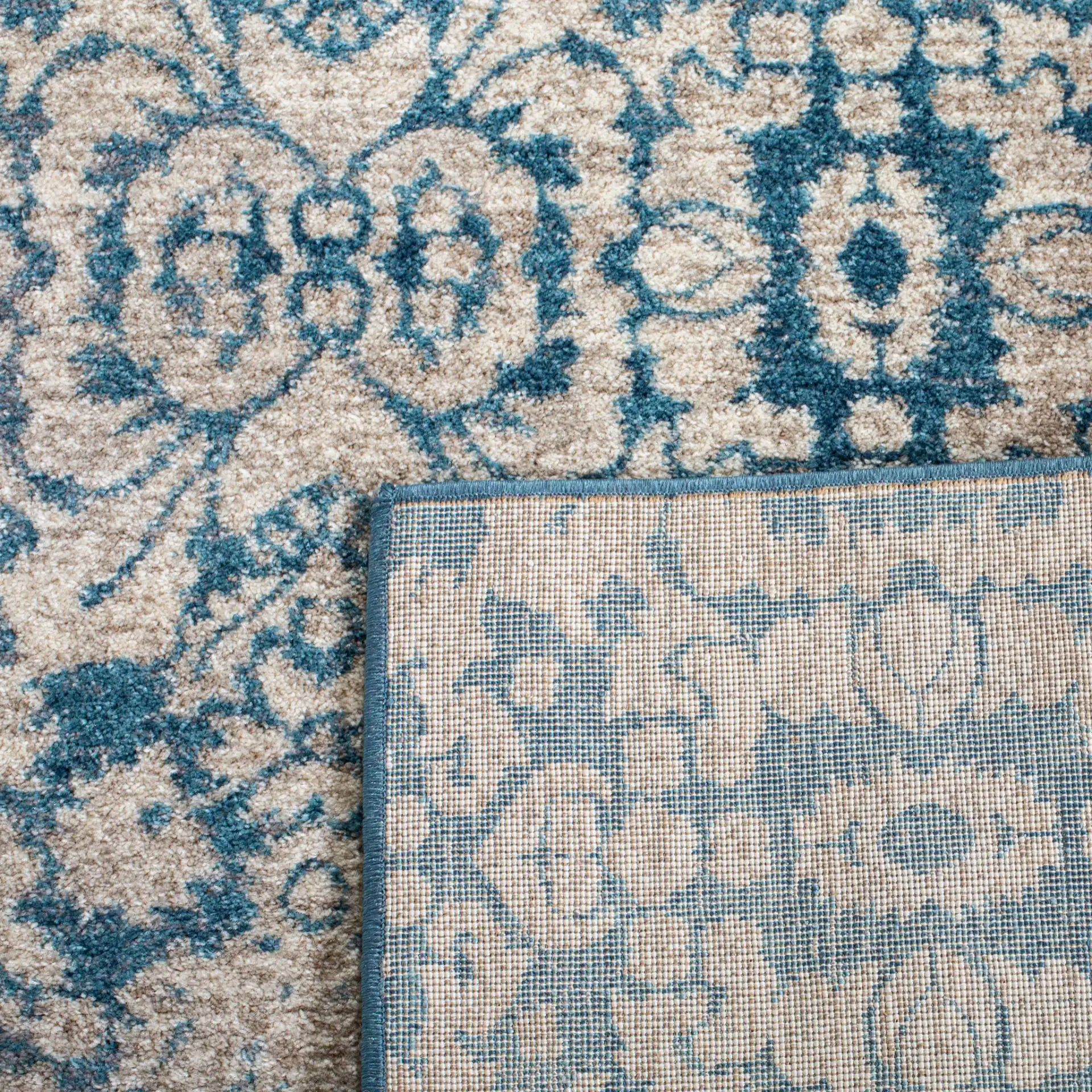 Sofia Damask Rug in Blue / Beige in a styled room