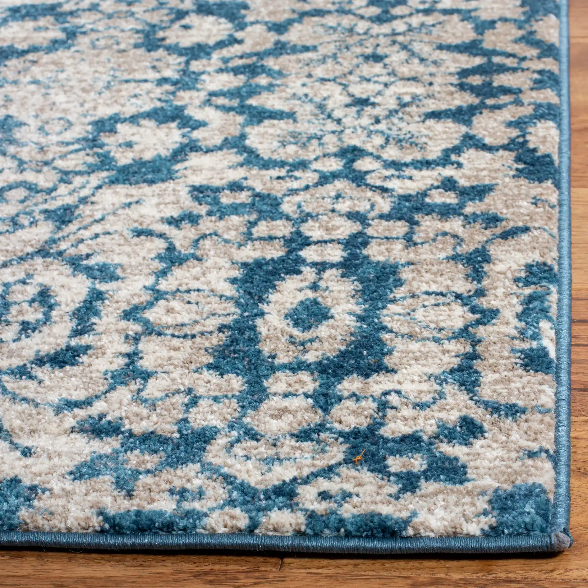 Sofia Damask Rug in Blue / Beige in a styled room