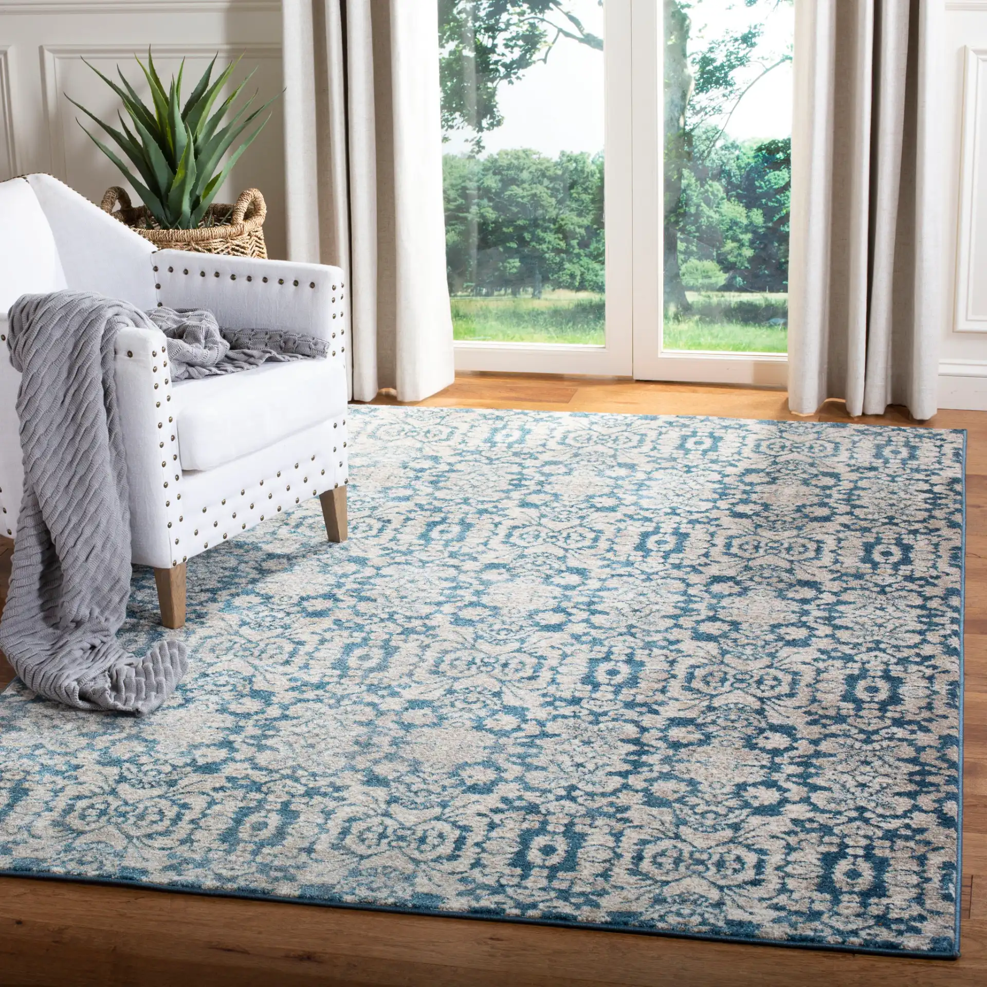 Sofia Damask Rug in Blue / Beige in a styled room
