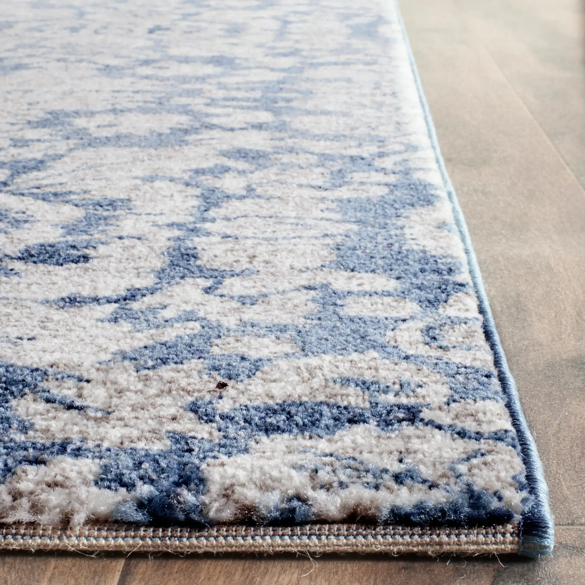 Sofia Damask Rug in Blue / Beige in a styled room
