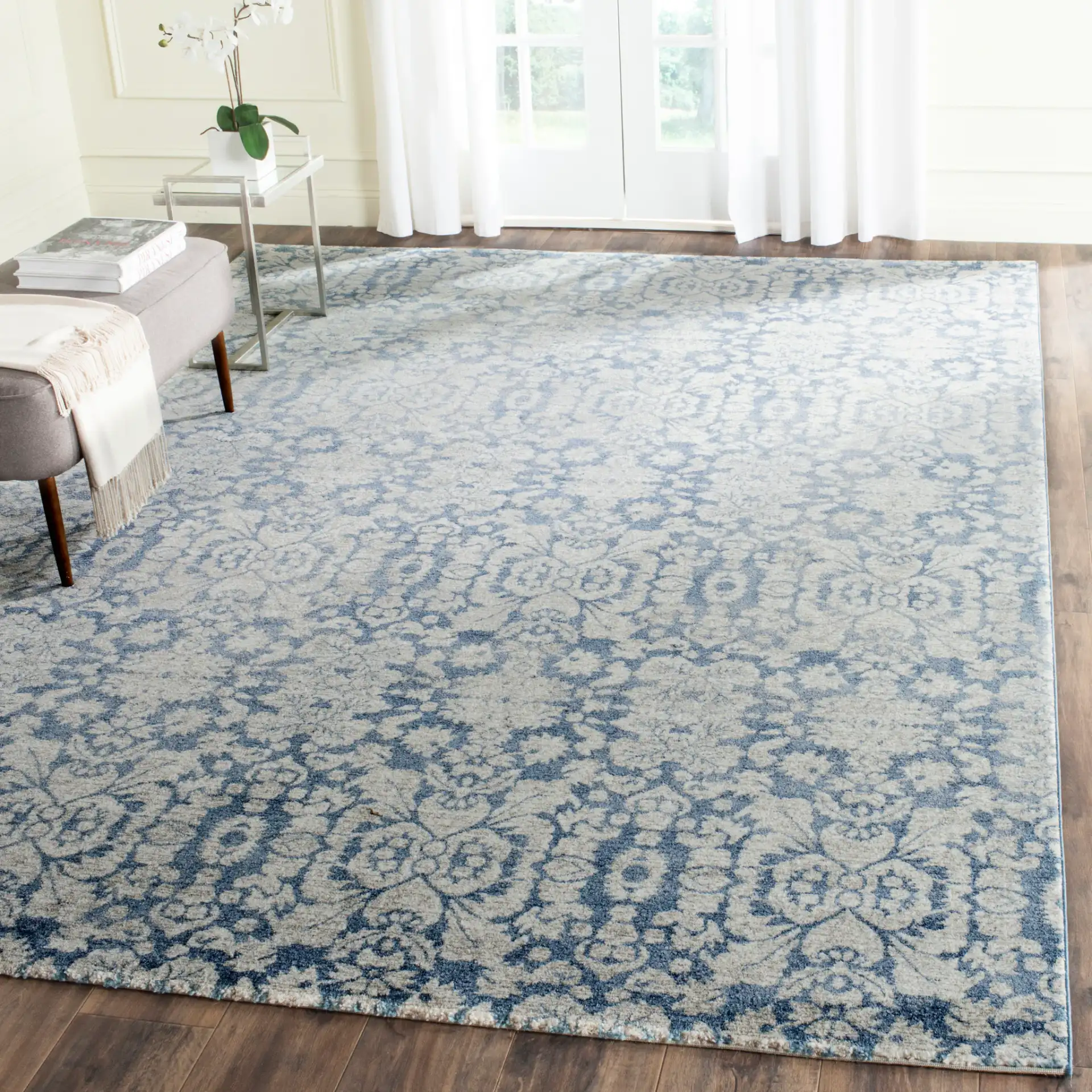 Sofia Damask Rug in Blue / Beige in a styled room