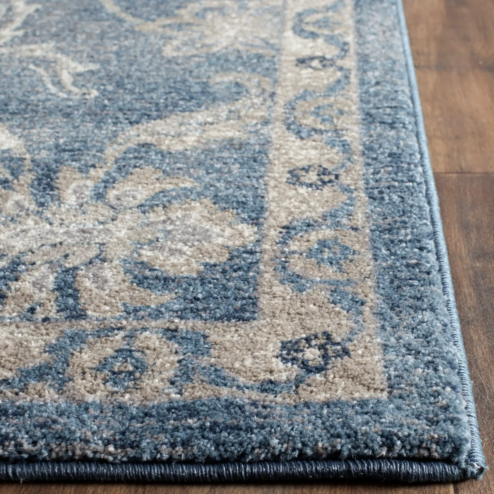 Sofia Floral Vine Rug in Blue / Beige in a styled room
