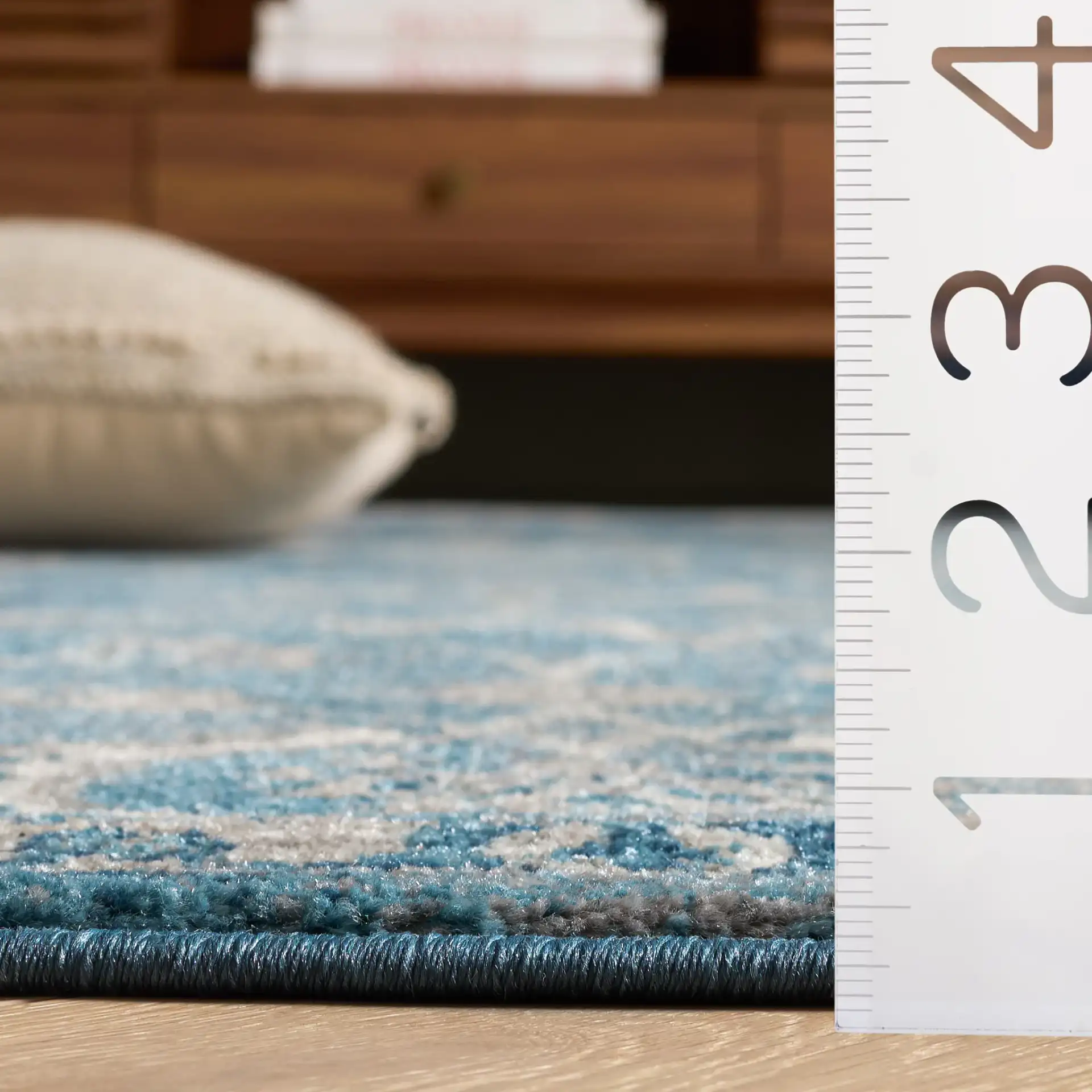 Sofia Floral Vine Rug in Blue / Beige in a styled room