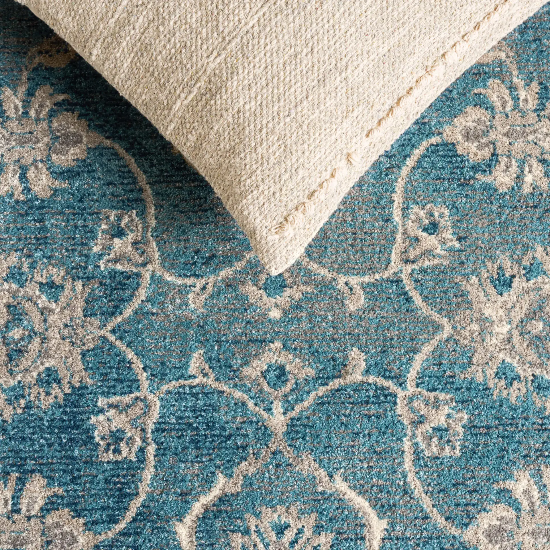 Sofia Floral Vine Rug in Blue / Beige in a styled room