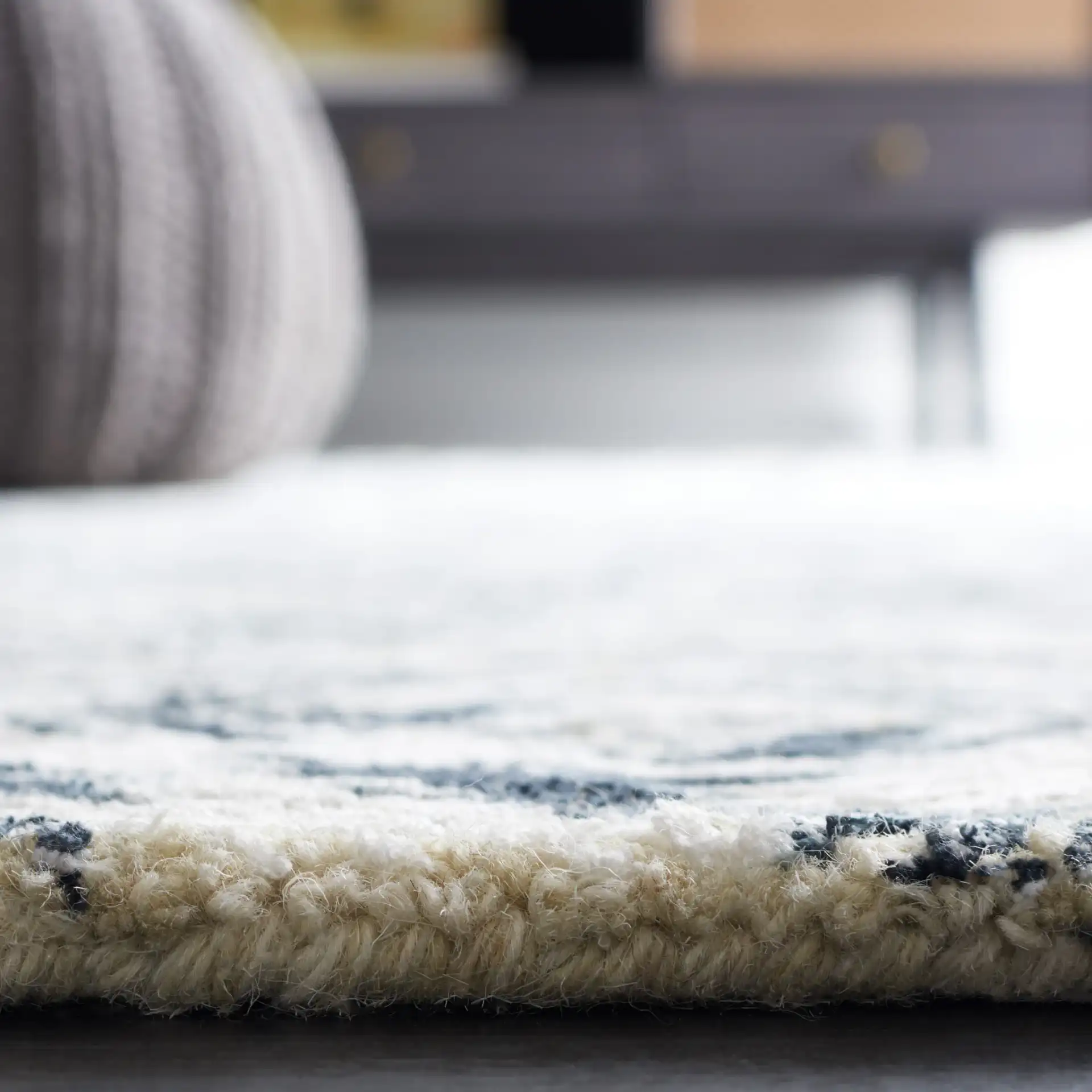 Soho Diamond Grid Hand-Tufted Rug in Ivory / Green in a styled room