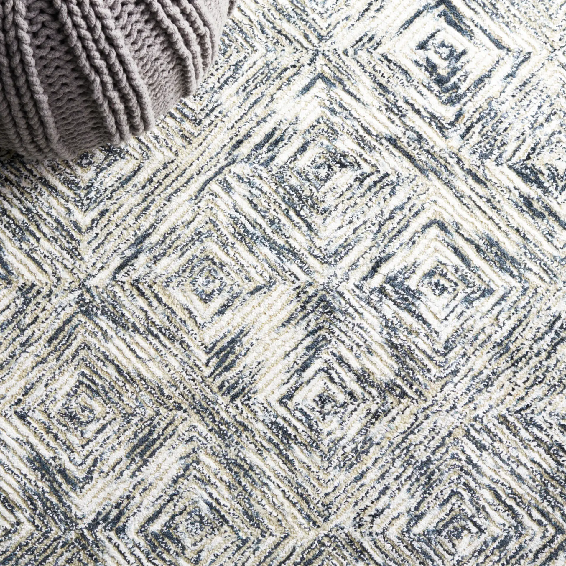 Soho Diamond Grid Hand-Tufted Rug in Ivory / Green in a styled room