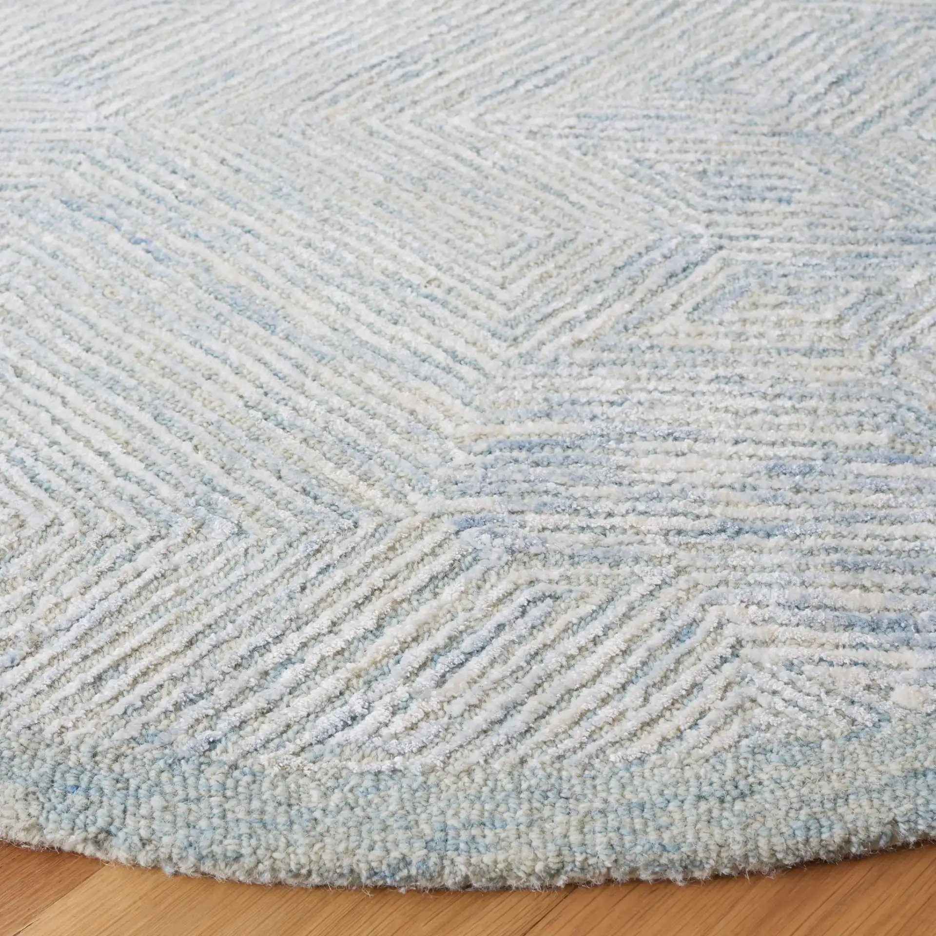 Soho Geometric Hand-Tufted Rug in Blue / Gray in a styled room