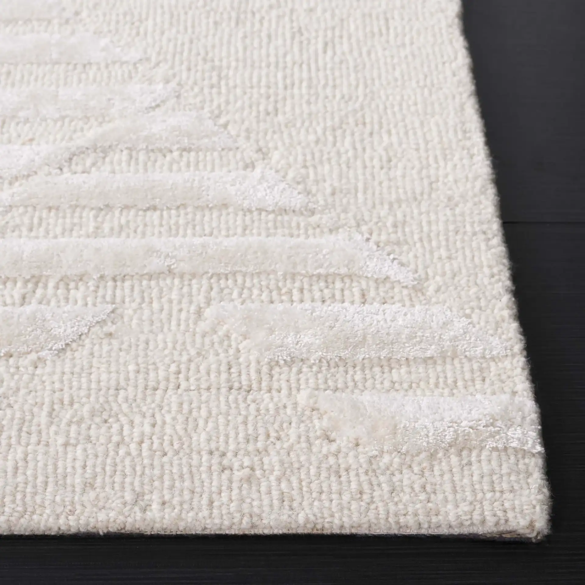Soho Striped Diamond Hand-Tufted Rug in Ivory in a styled room