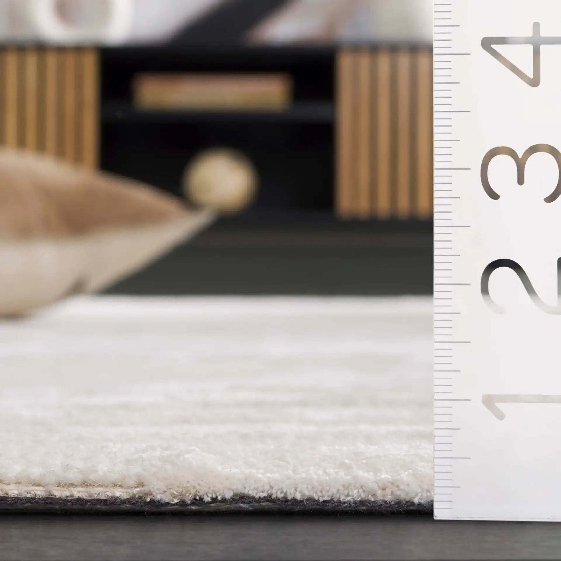 Soho Striped Diamond Hand-Tufted Rug in Ivory in a styled room