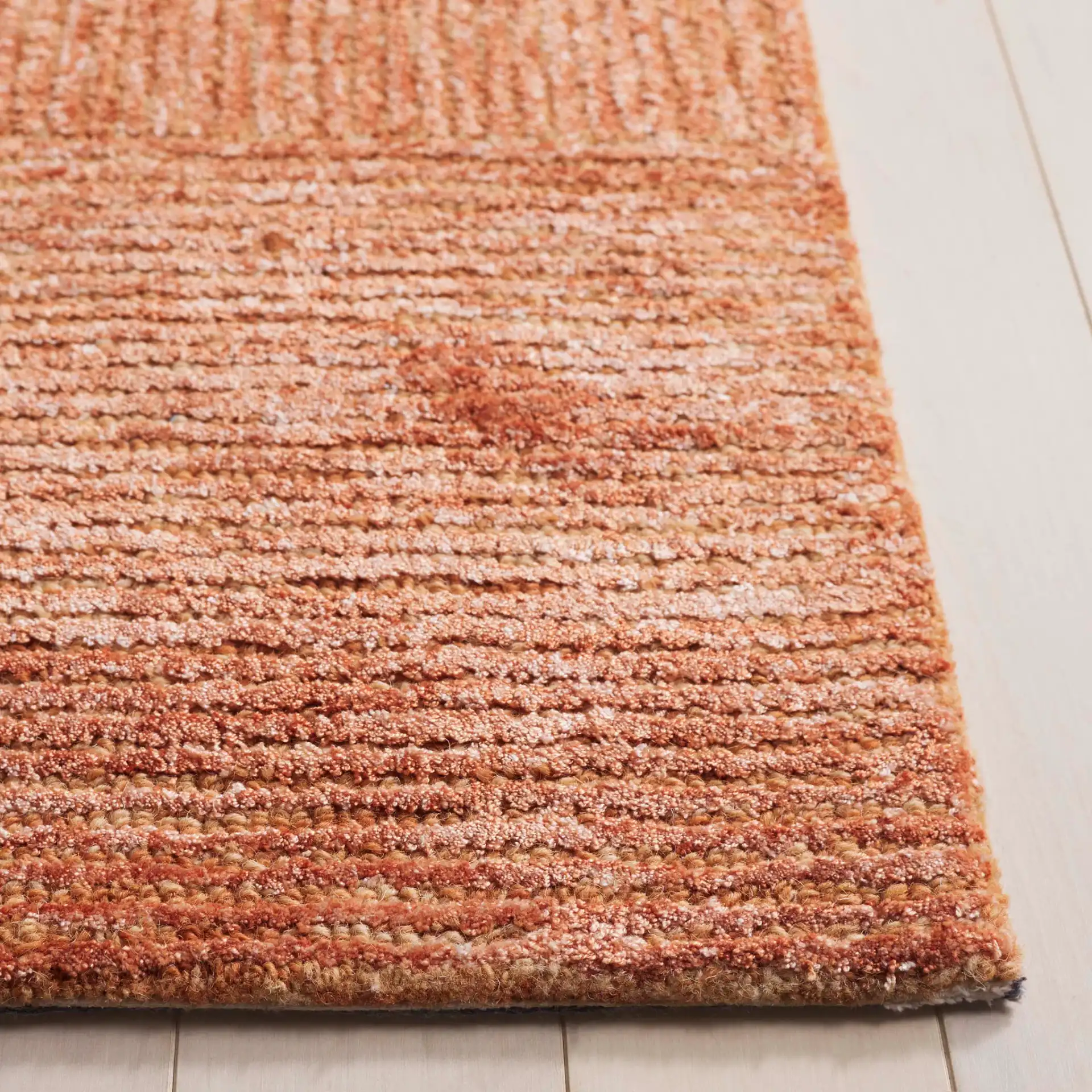 Soho Checkerboard Hand-Tufted Rug in Rust in a styled room