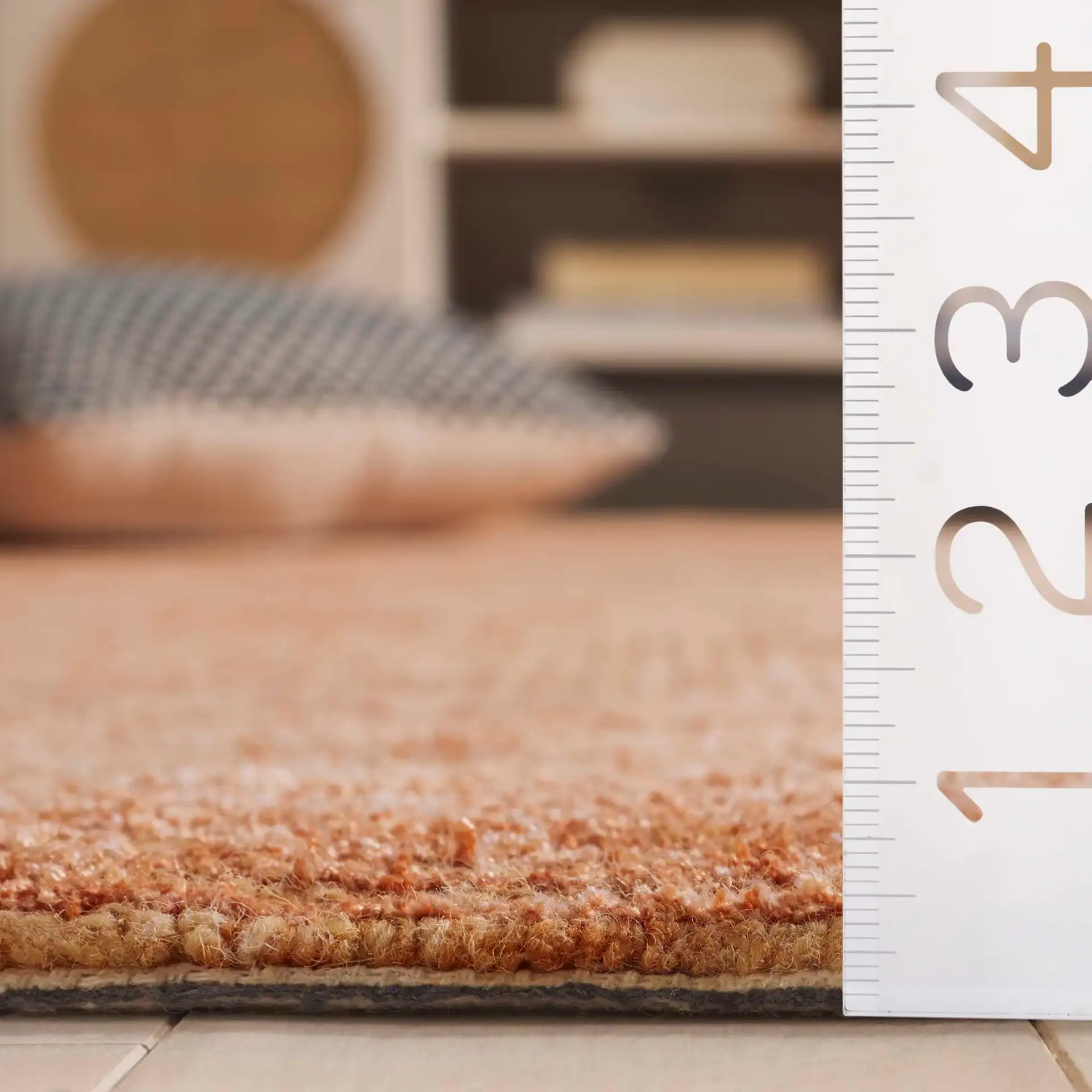 Soho Checkerboard Hand-Tufted Rug in Rust in a styled room