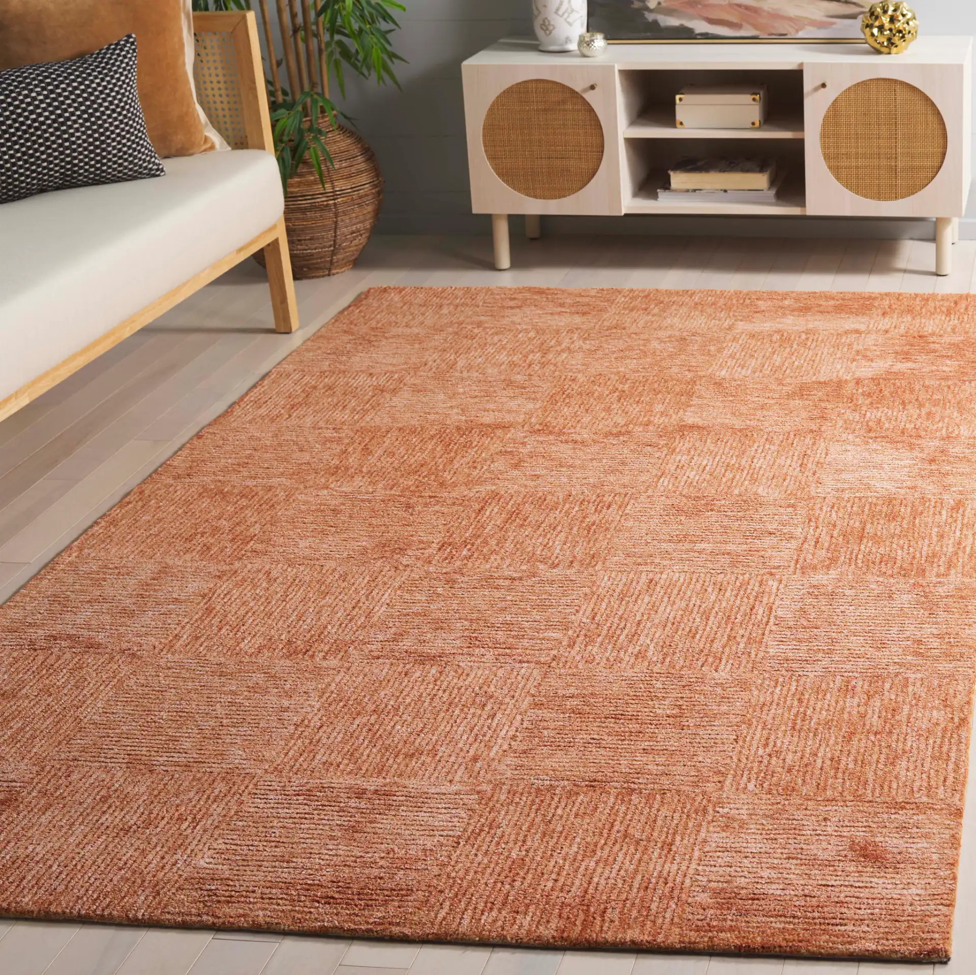 Soho Checkerboard Hand-Tufted Rug in Rust in a styled room