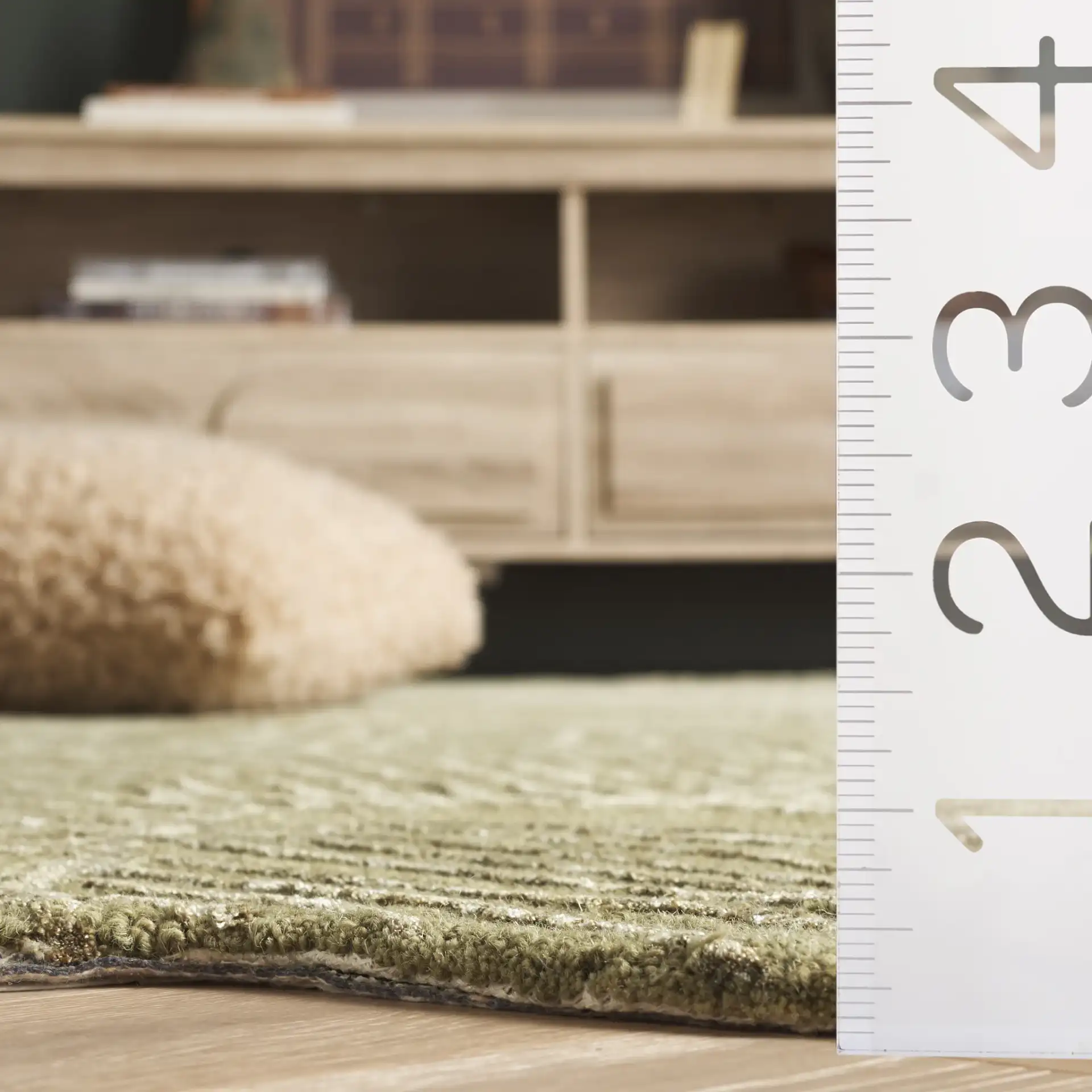Soho Tropical Leaf Hand-Tufted Rug in Green in a styled room