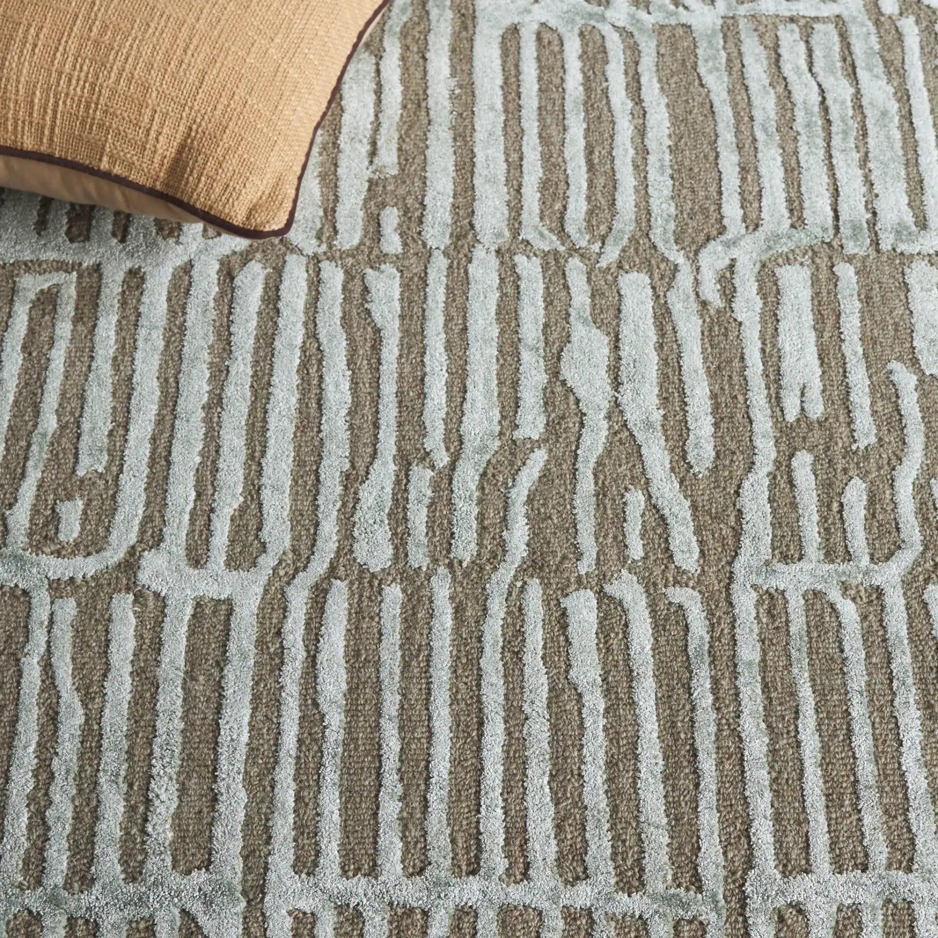 Soho Linear Abstract Hand-Tufted Rug in Green / Brown in a styled room