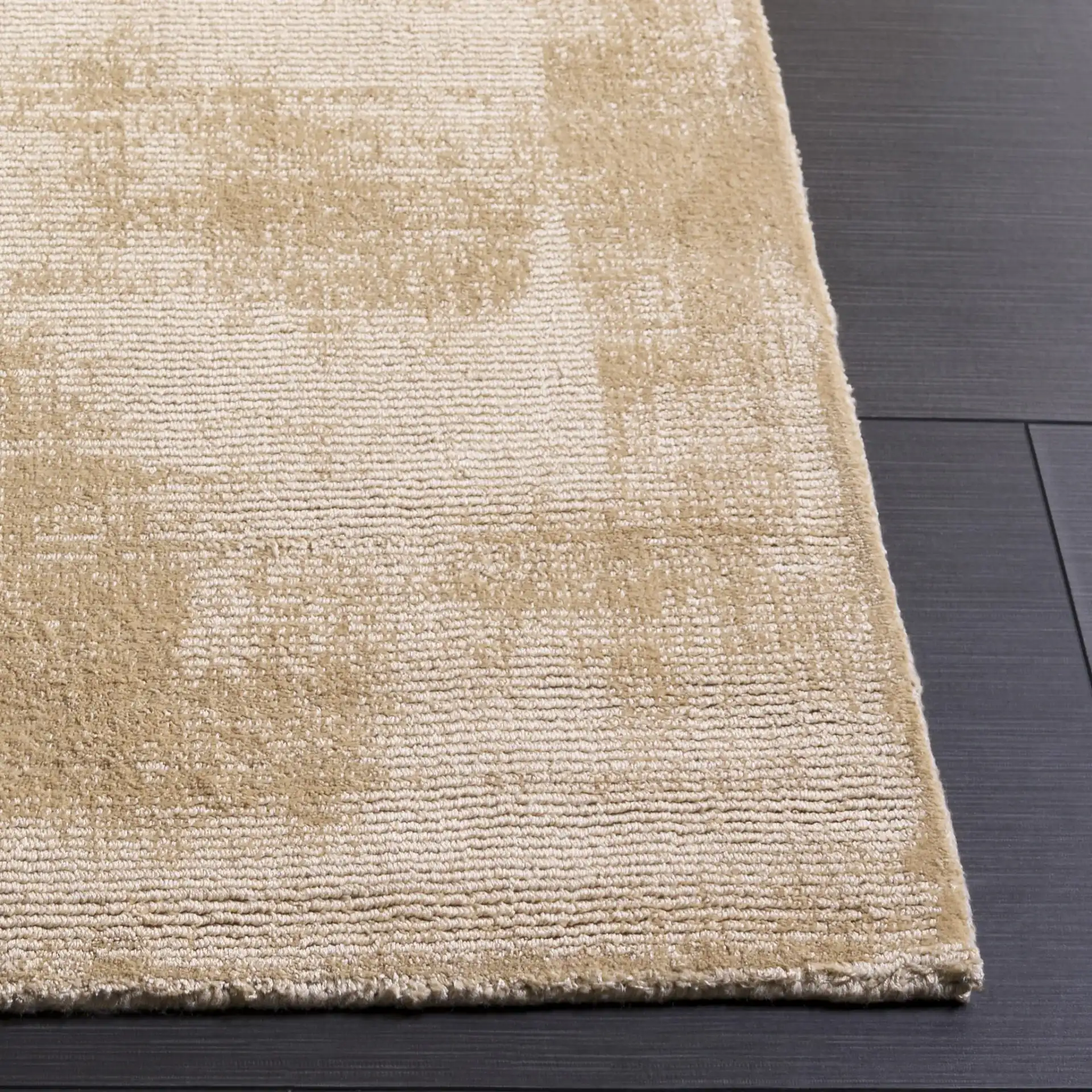 Soho Solid Viscose Rug in Beige / Gold in a styled room