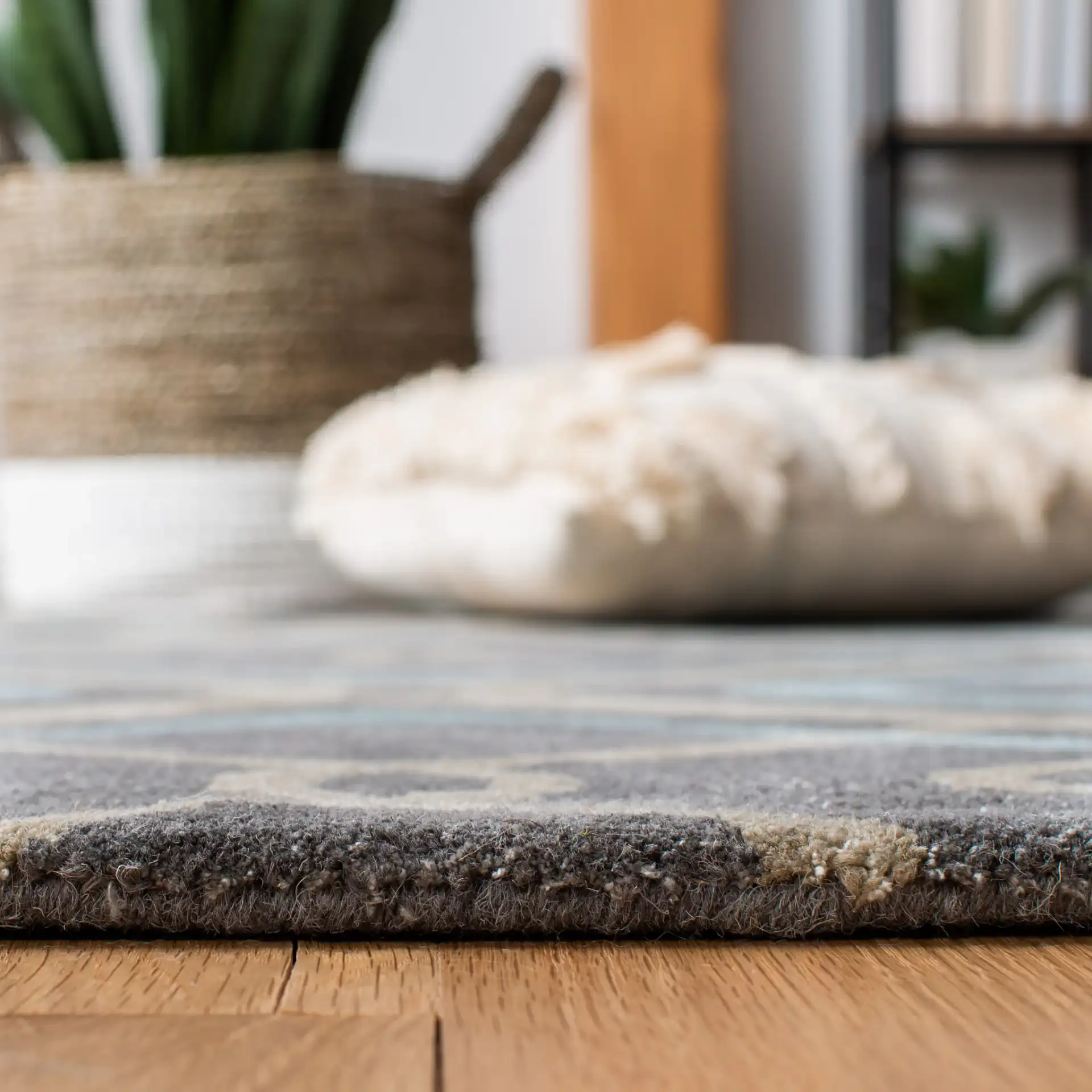 Soho Interlocking Diamond Hand-Tufted Rug in Gray / Multicolor in a styled room