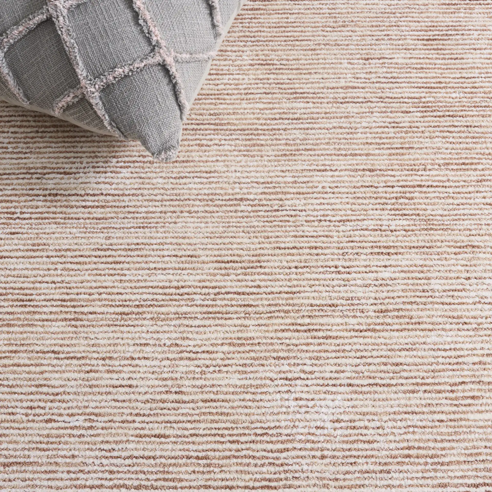 Soho Ribbed Hand-Tufted Rug in Rust in a styled room