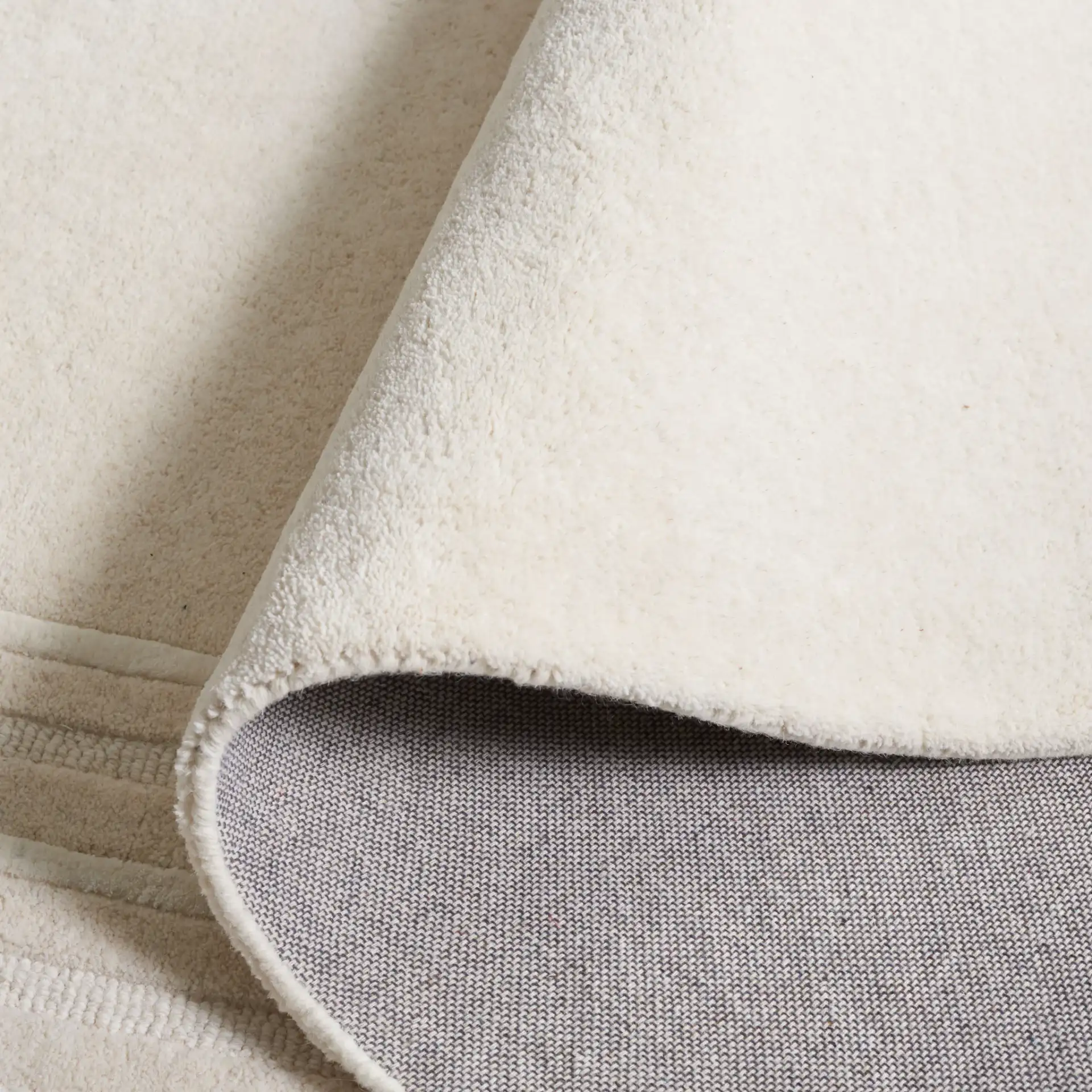 Soho Linear Path Hand-Tufted Rug in Beige / Ivory in a styled room