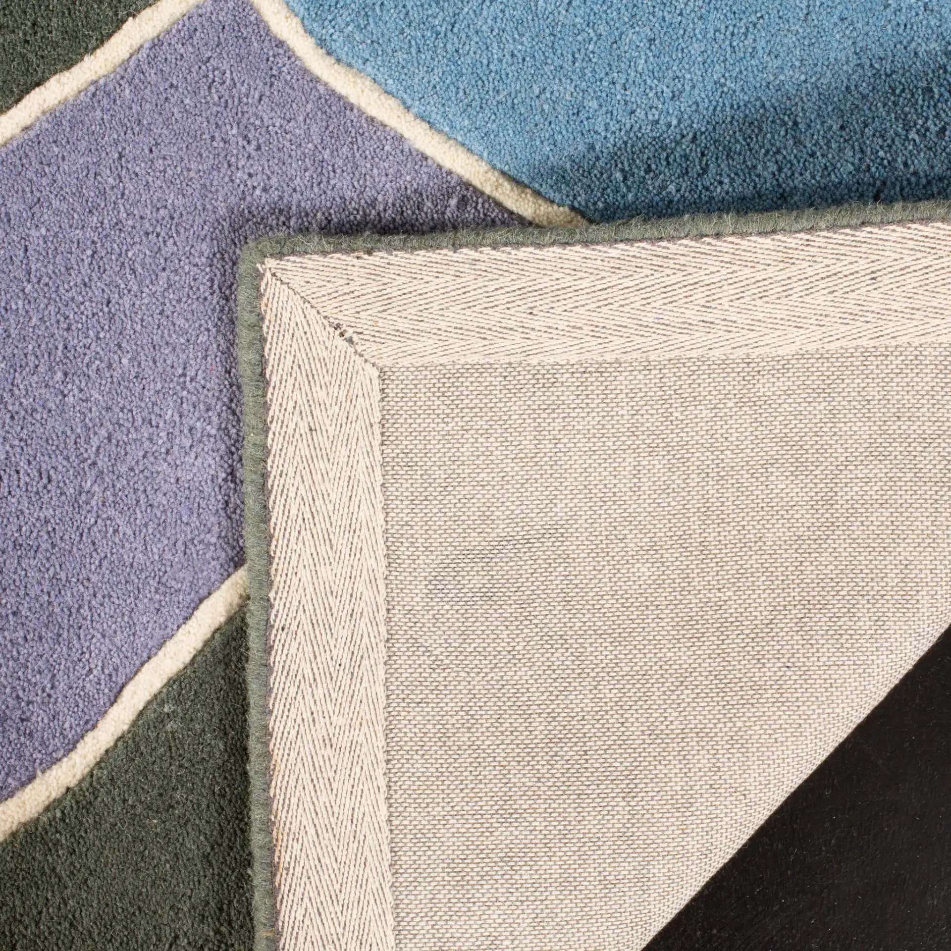 Soho Interlocking Waves Hand-Tufted Rug in Multicolor in a styled room