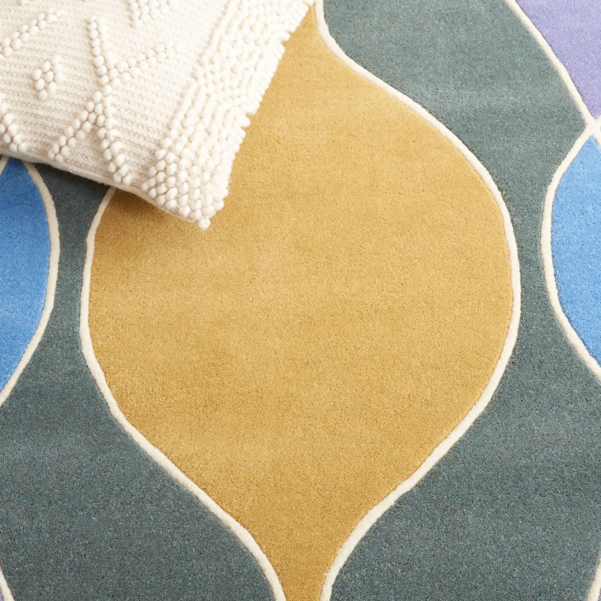 Soho Interlocking Waves Hand-Tufted Rug in Multicolor in a styled room