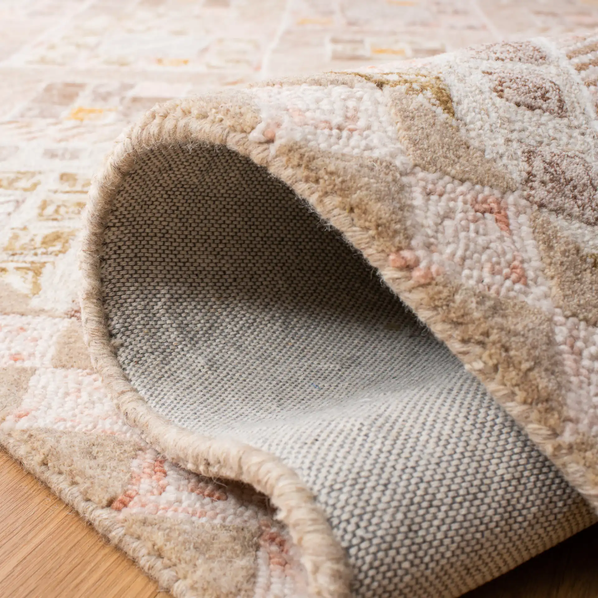 Soho Diamond Lattice Hand-Tufted Wool Rug in Pink / Taupe in a styled room